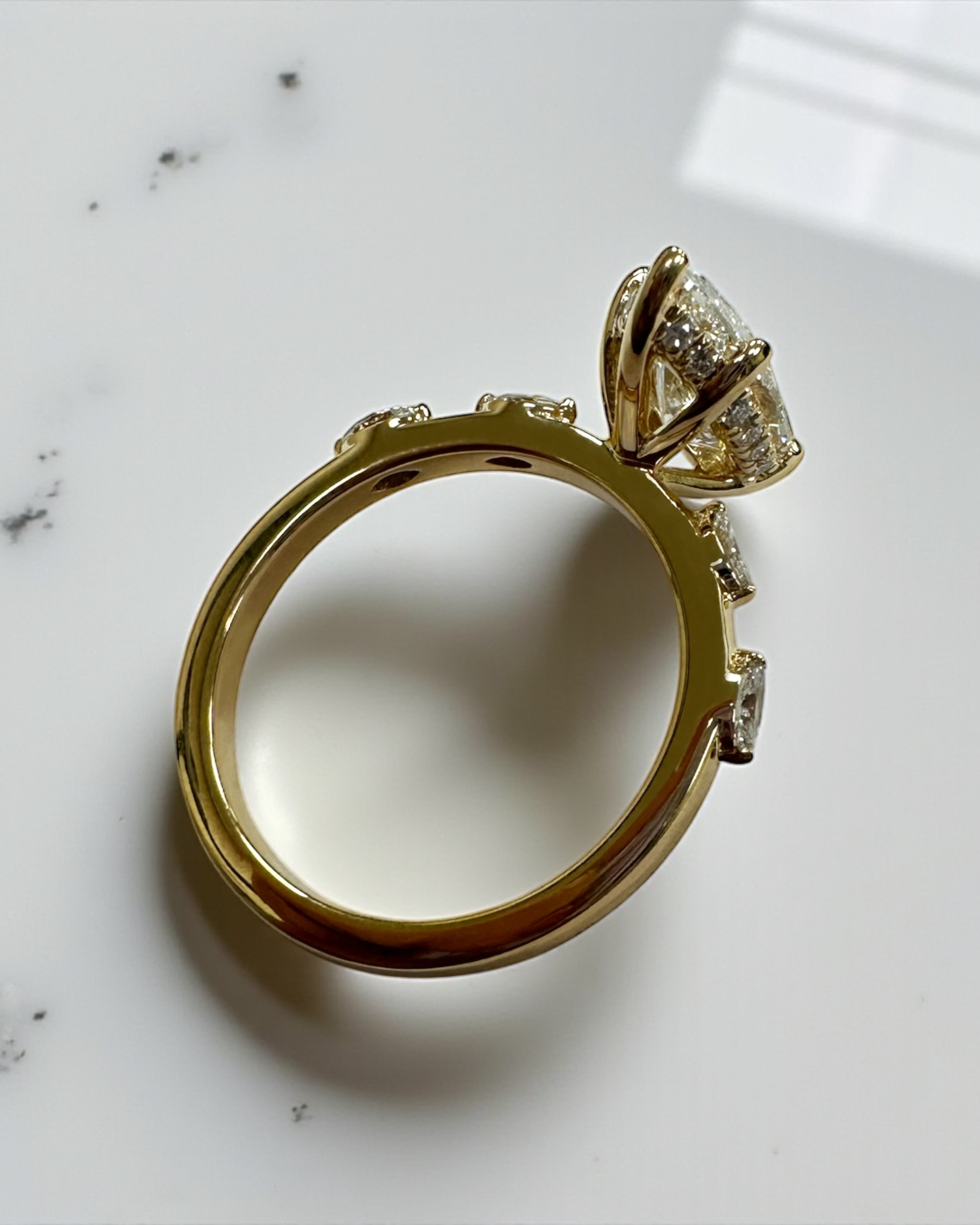 2ct marquise cut lab grown diamond marquise band spaced band hidden halo 18kt yellow gold engagement ring