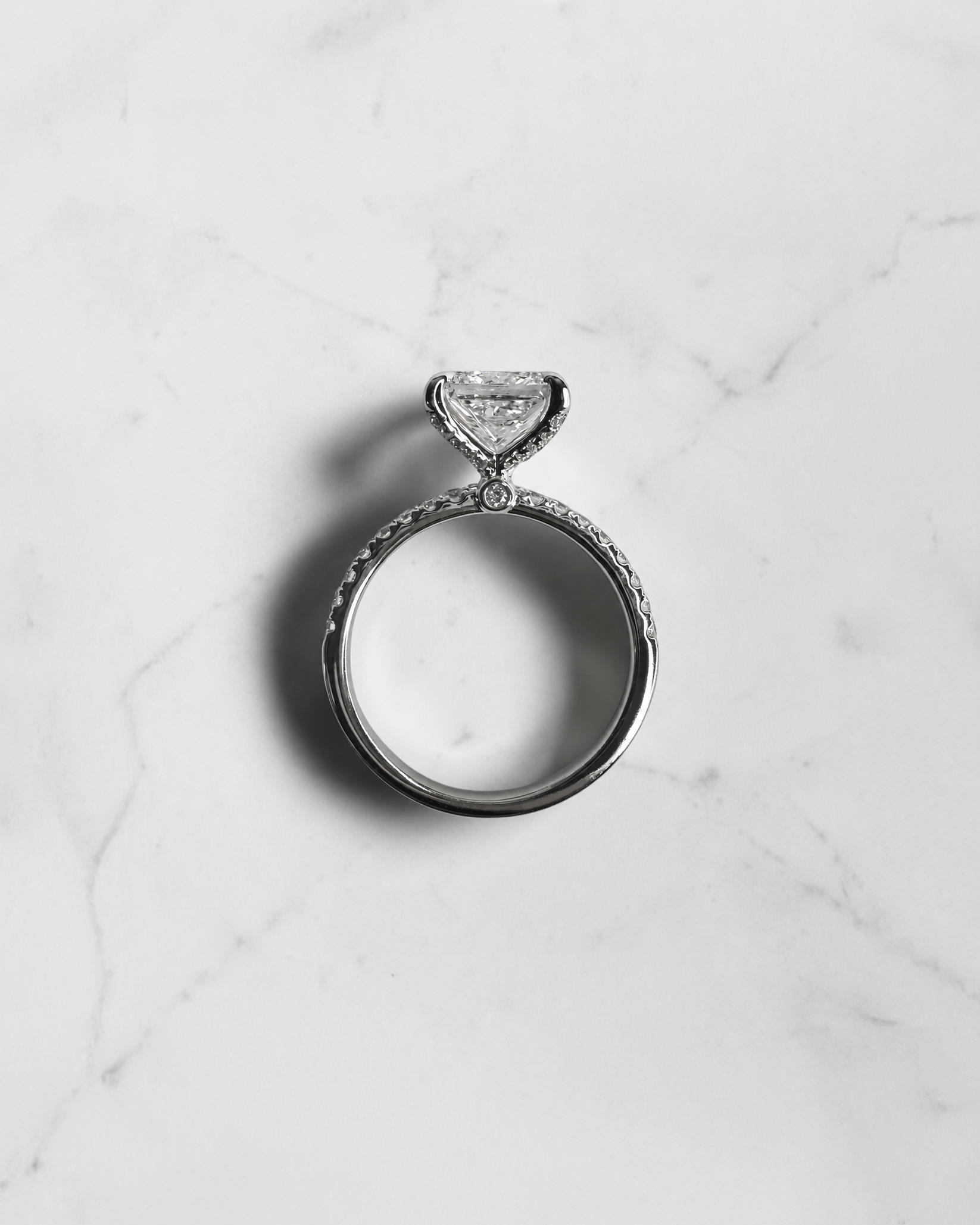 2ct princess cut diamond engagement ring with open diamond prongs and pavé band, 2.34ct total, white gold, handcrafted in London