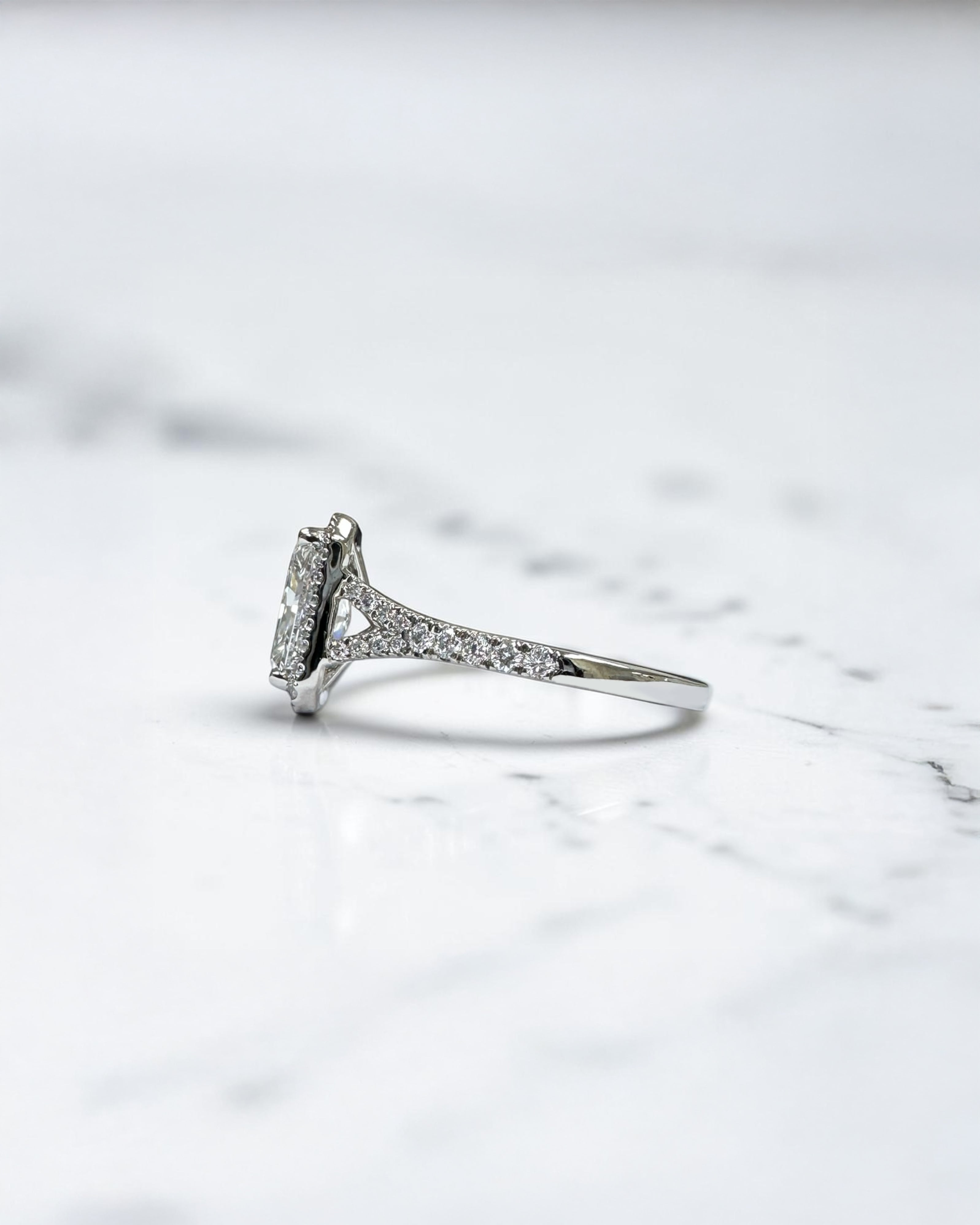 2ct radiant cut lab grown diamond halo engagement ring with diamond split shank band, approximately 2.42ct total diamond weight, handcrafted in platinum or 18kt gold by Layla Diamonds.