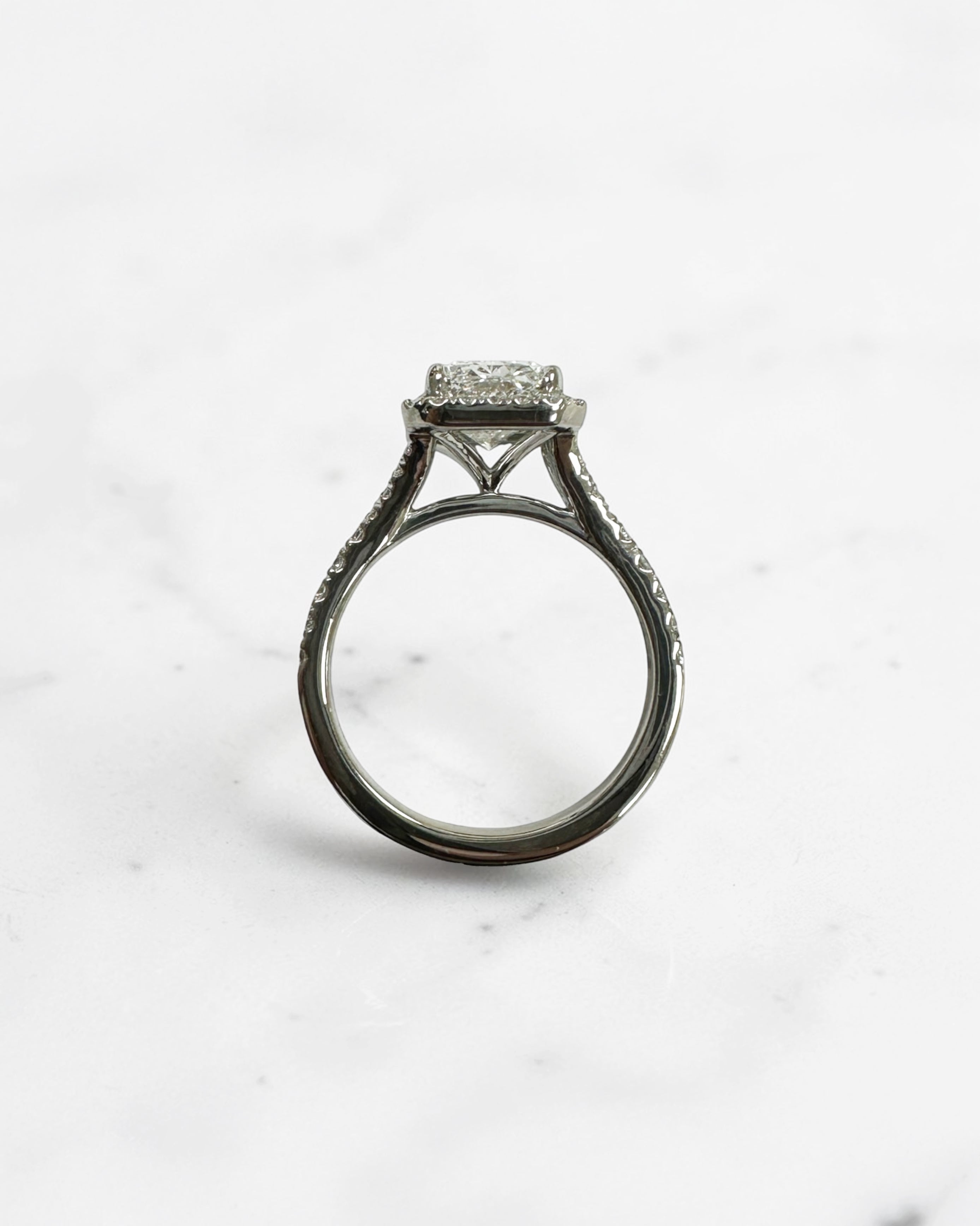 2ct radiant cut lab grown diamond halo engagement ring with diamond split shank band, approximately 2.42ct total diamond weight, handcrafted in platinum or 18kt gold by Layla Diamonds.