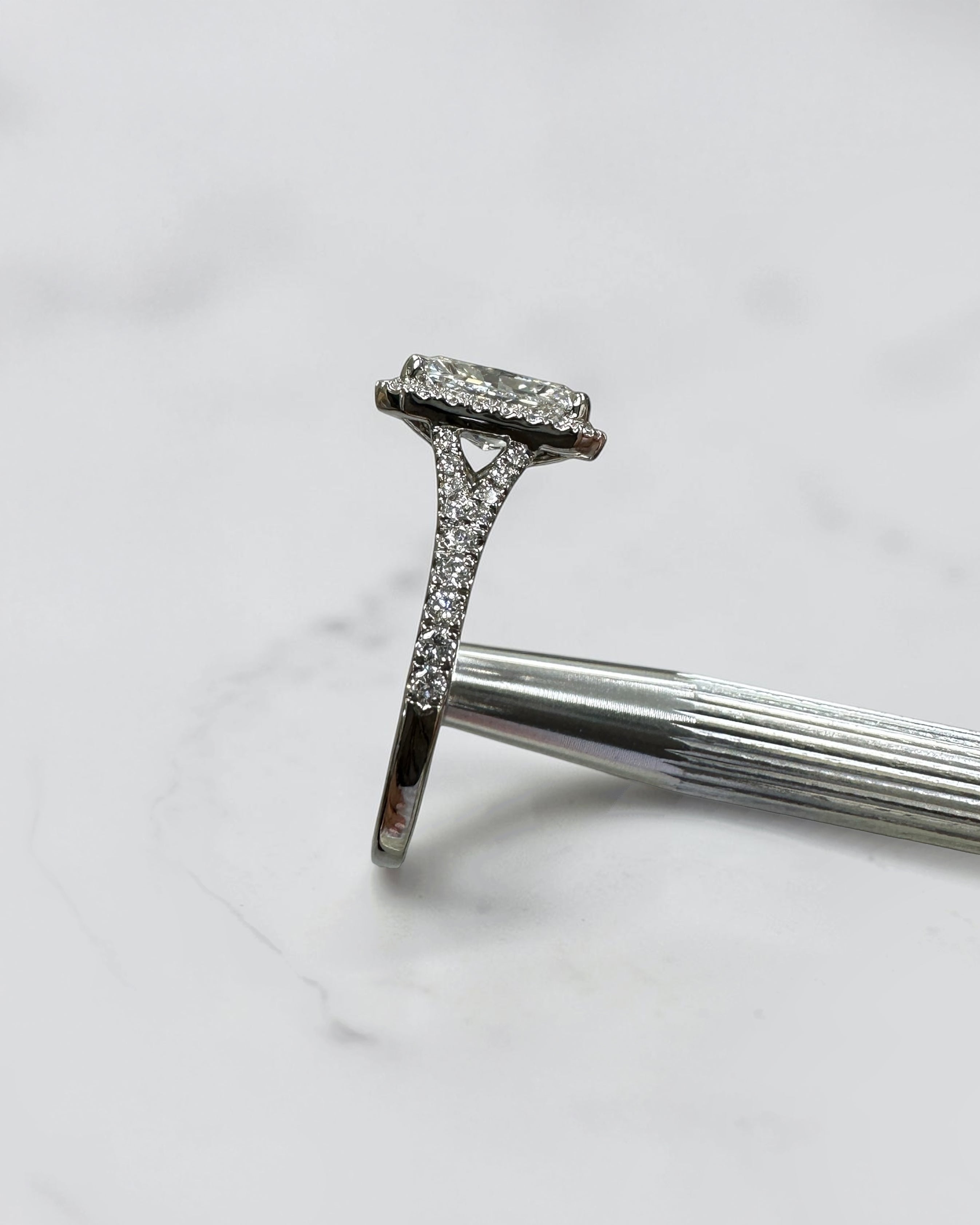 2ct radiant cut lab grown diamond halo engagement ring with diamond split shank band, approximately 2.42ct total diamond weight, handcrafted in platinum or 18kt gold by Layla Diamonds.