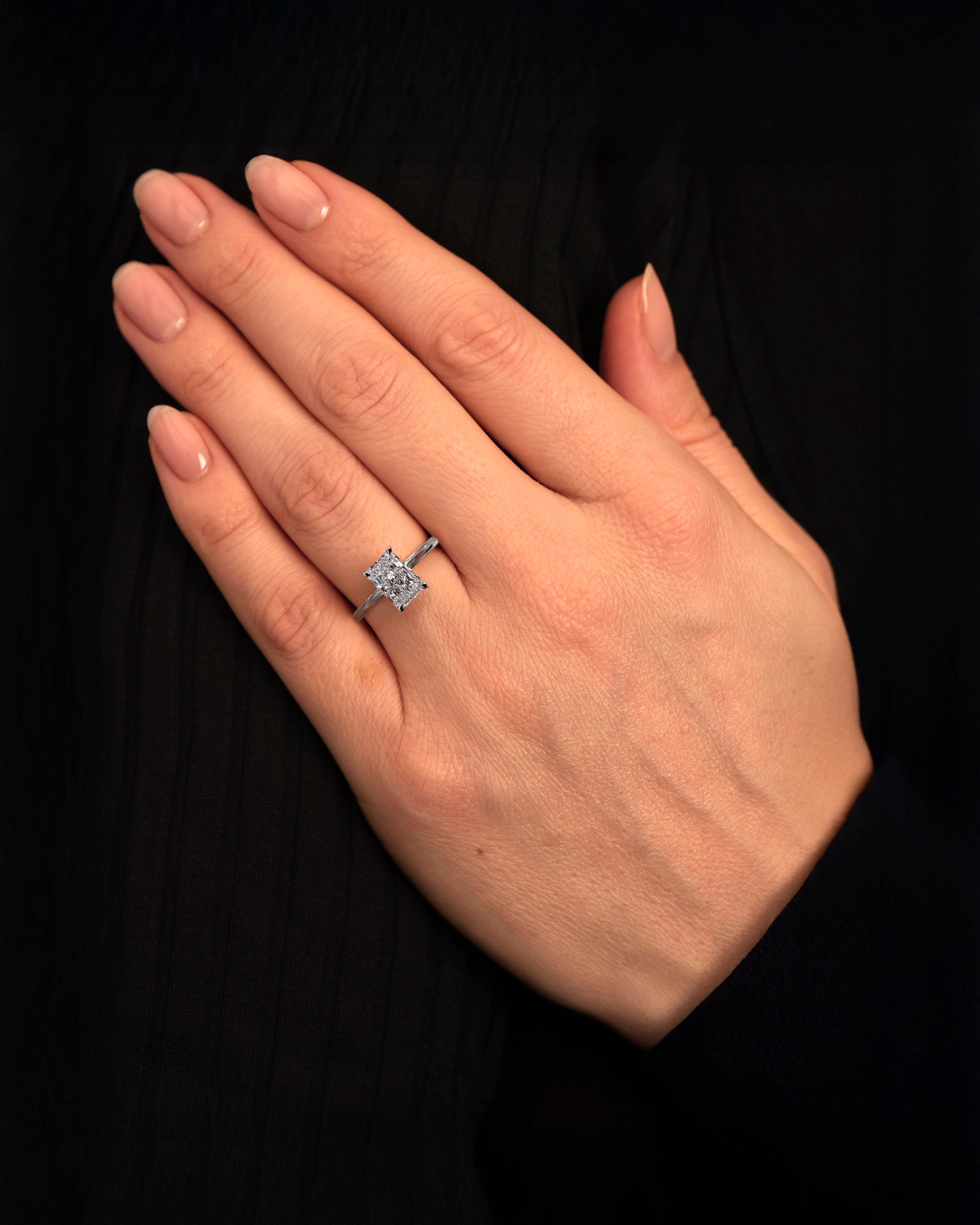 2ct Radiant Cut Lab Grown Diamond Floating Head Solitaire Engagement Ring on hand