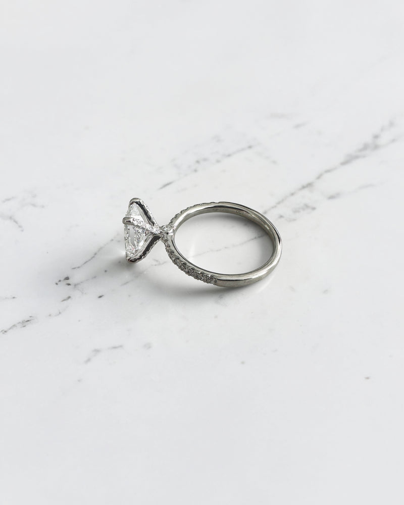 2ct radiant cut lab grown diamond engagement ring with open diamond set prongs and pavé diamond band in white gold, total 2.34ct