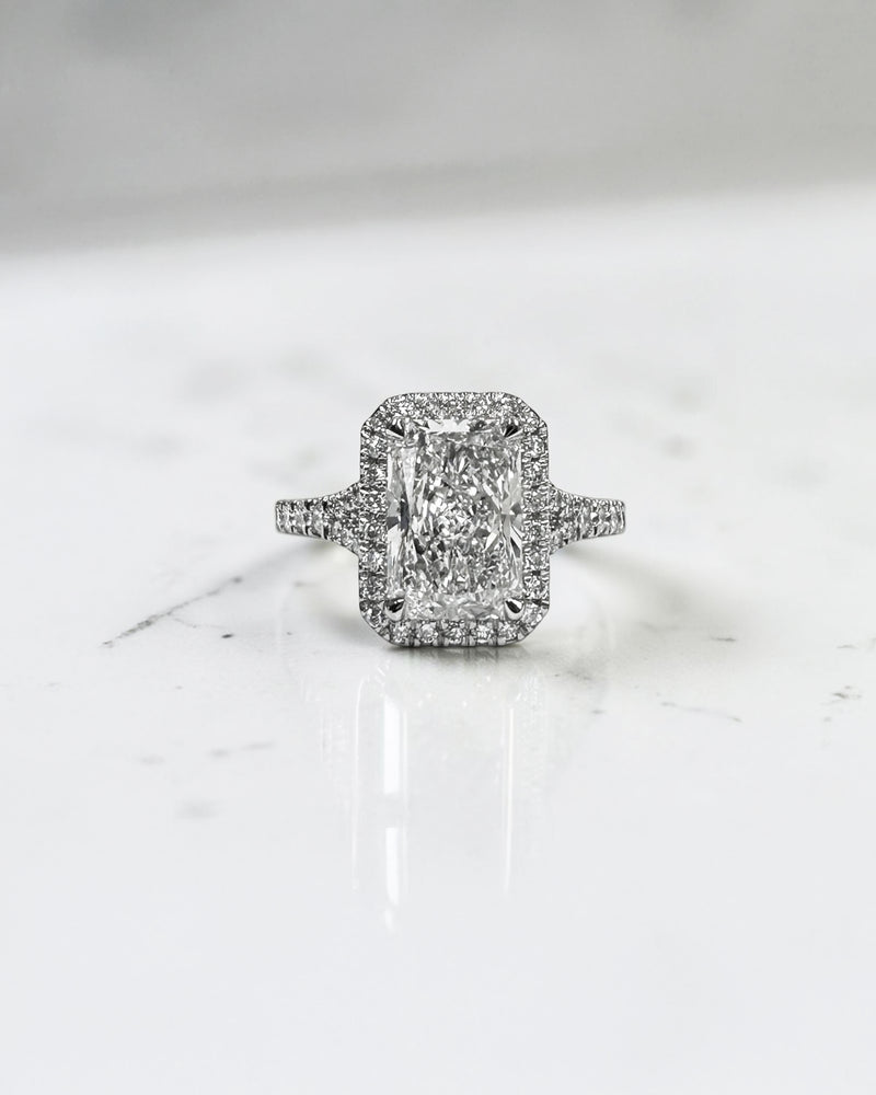 2ct radiant cut lab grown diamond halo engagement ring with diamond split shank band, approximately 2.42ct total diamond weight, handcrafted in platinum or 18kt gold by Layla Diamonds.