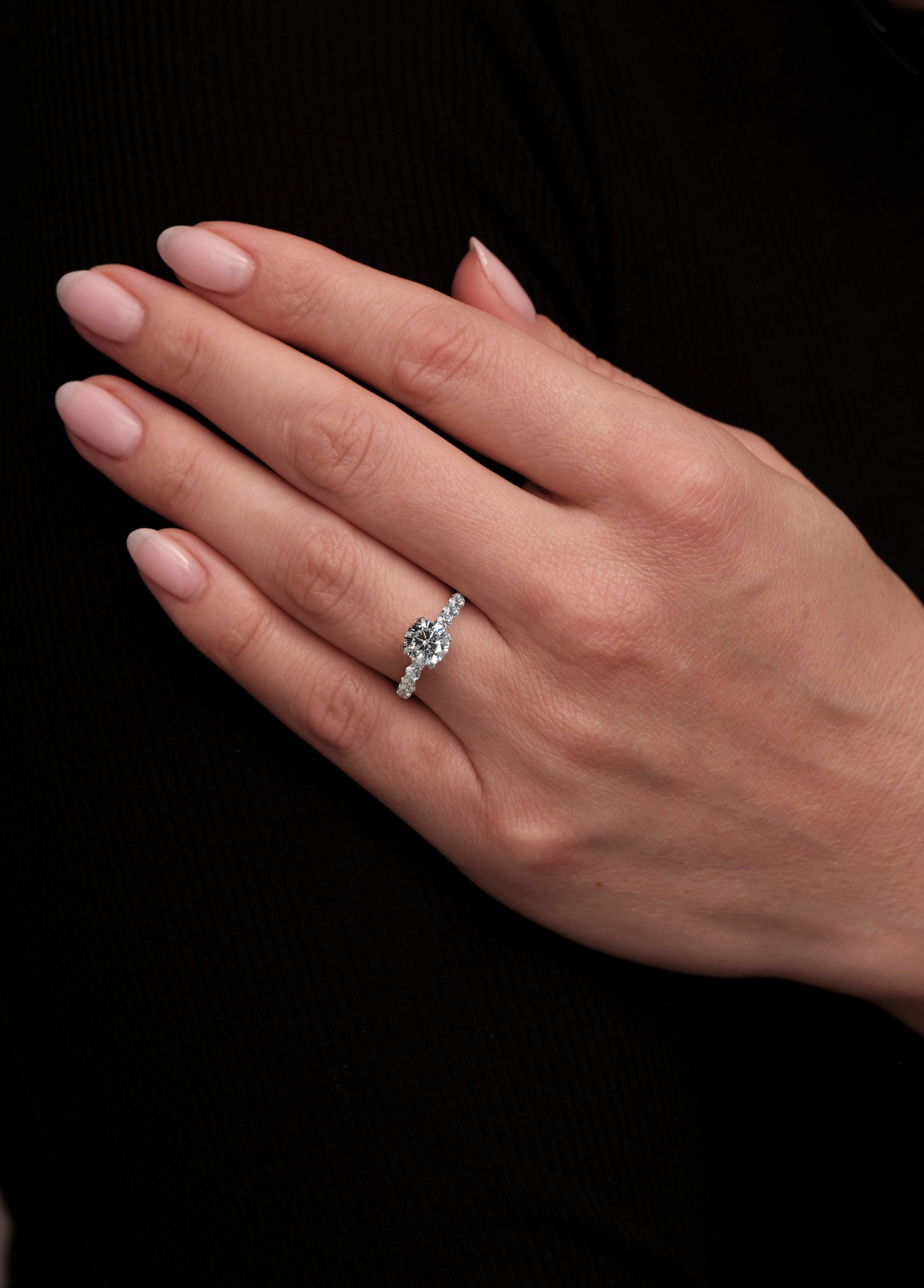 lab grown 2ct Round brilliant cut U Prong Setting Engagement ring on hand