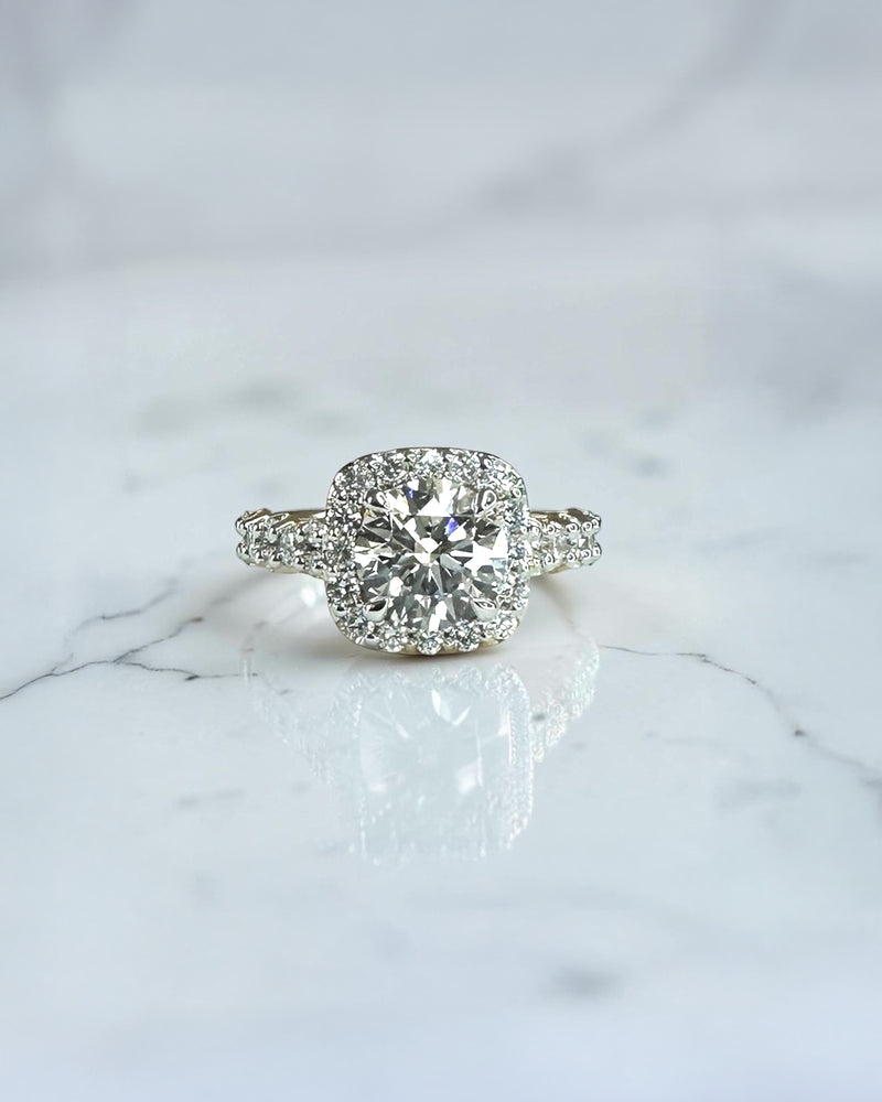 2ct round halo lab grown diamond engagement ring with diamond halo, fancy diamond shoulders and 3ct total diamond weight in 9ct yellow or white gold.