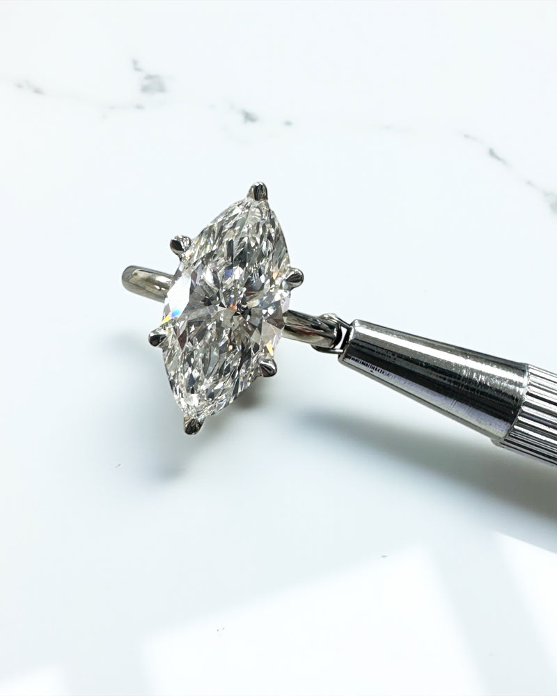 Top view of a lab grown 3.50ct marquise diamond ring solitaire.
