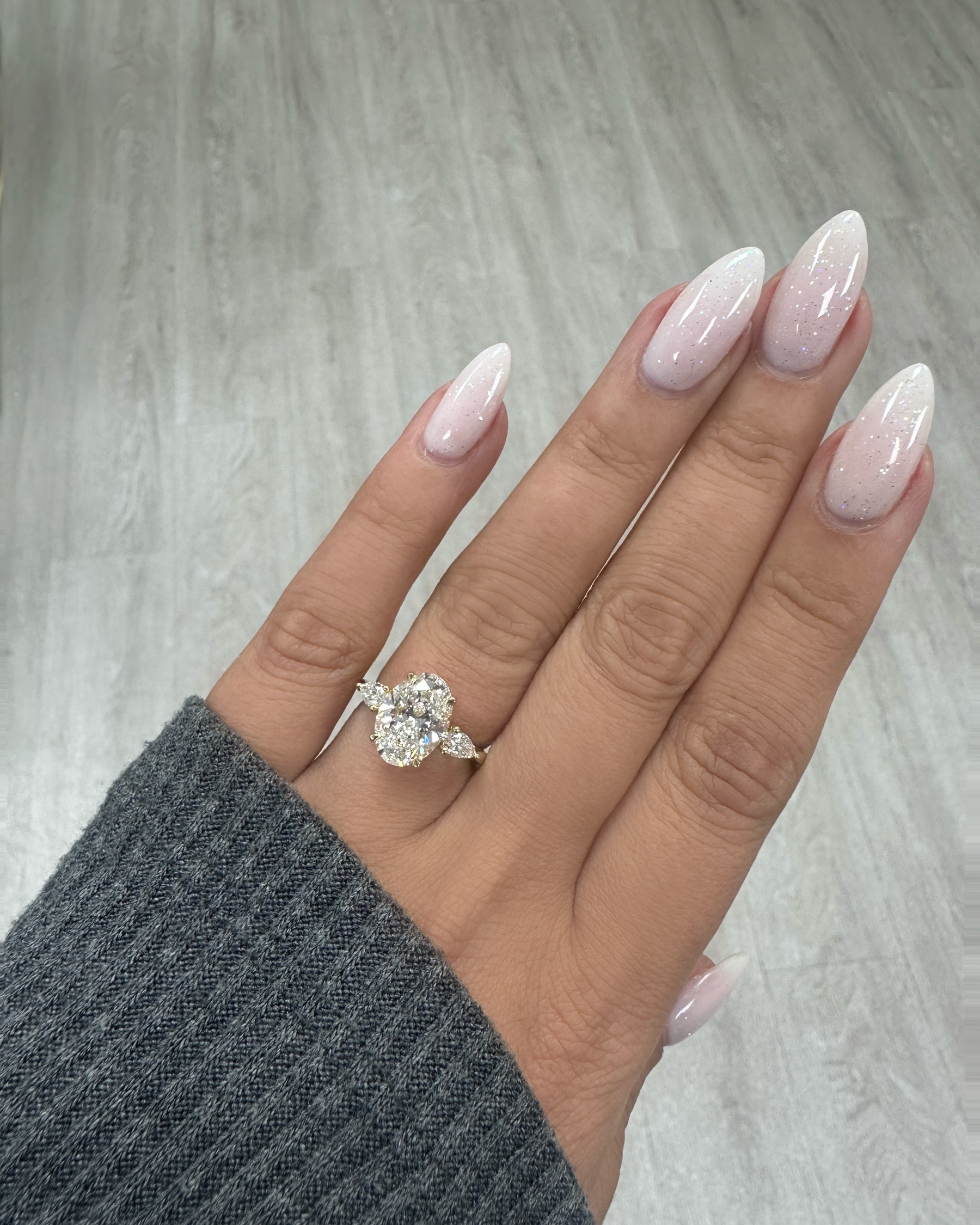 3.50ct Oval Cut Lab grown diamonds with Pear cut diamond trilogy engagement ring 18kt yellow gold 