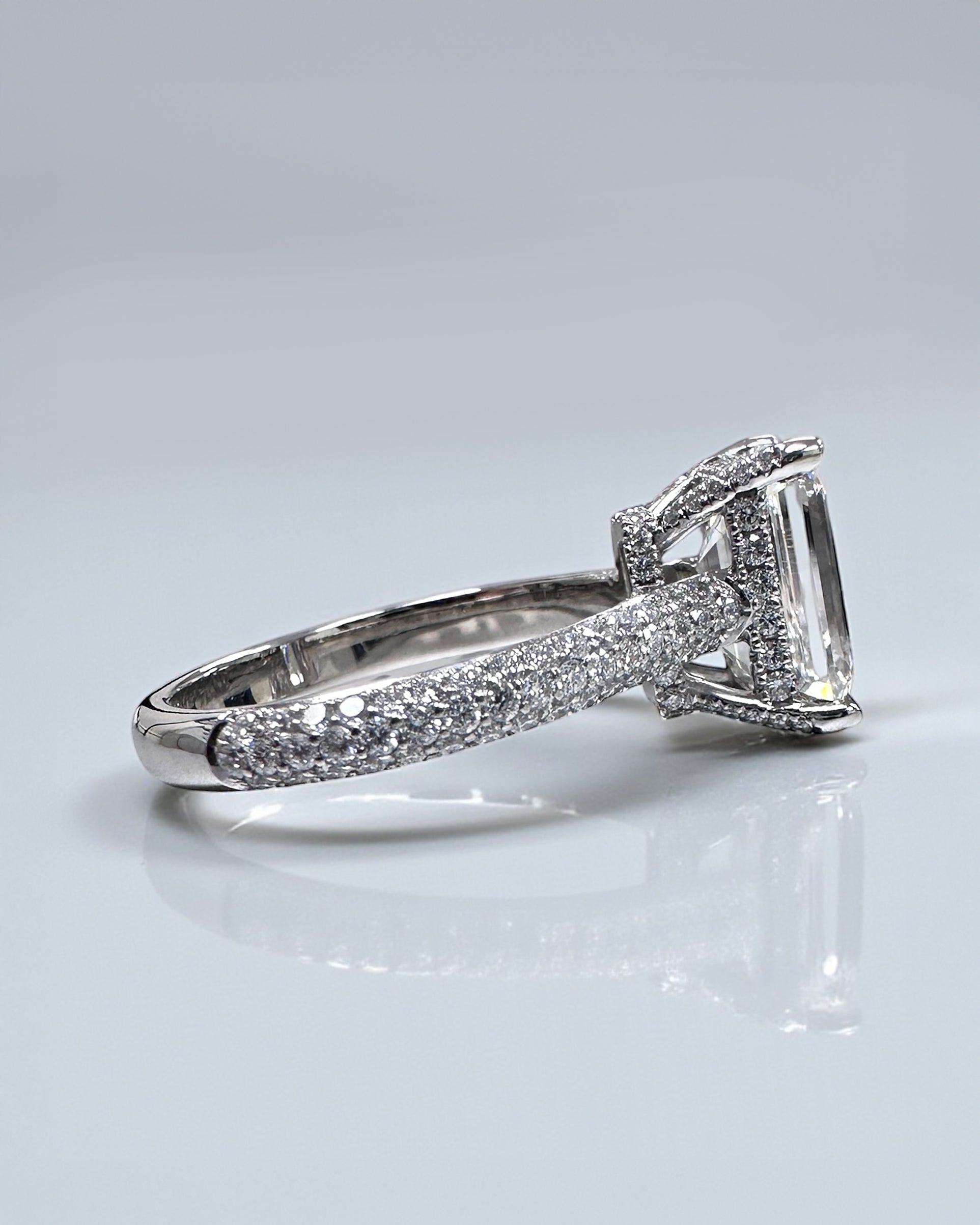 3ct Emerald Cut Lab grown diamond 3d band cathedral setting hidden halo engagement ring, made in London by Layla Diamonds, platinum or 18kt gold