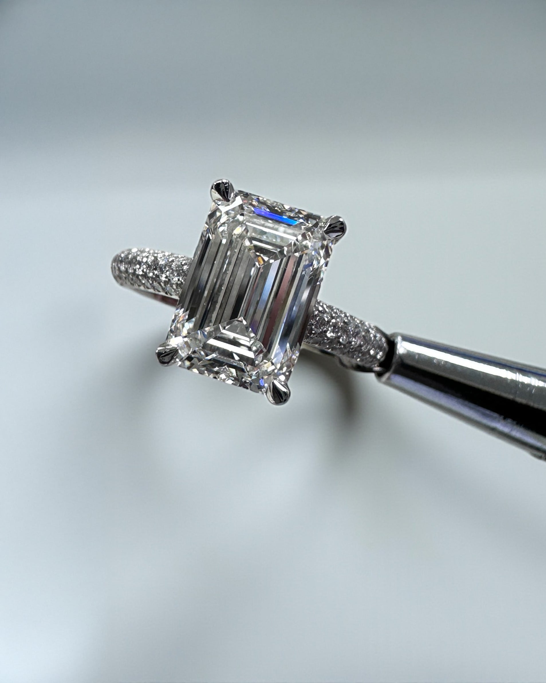 3ct Emerald Cut Lab grown diamond 3d band cathedral setting hidden halo engagement ring, made in London by Layla Diamonds, platinum or 18kt gold