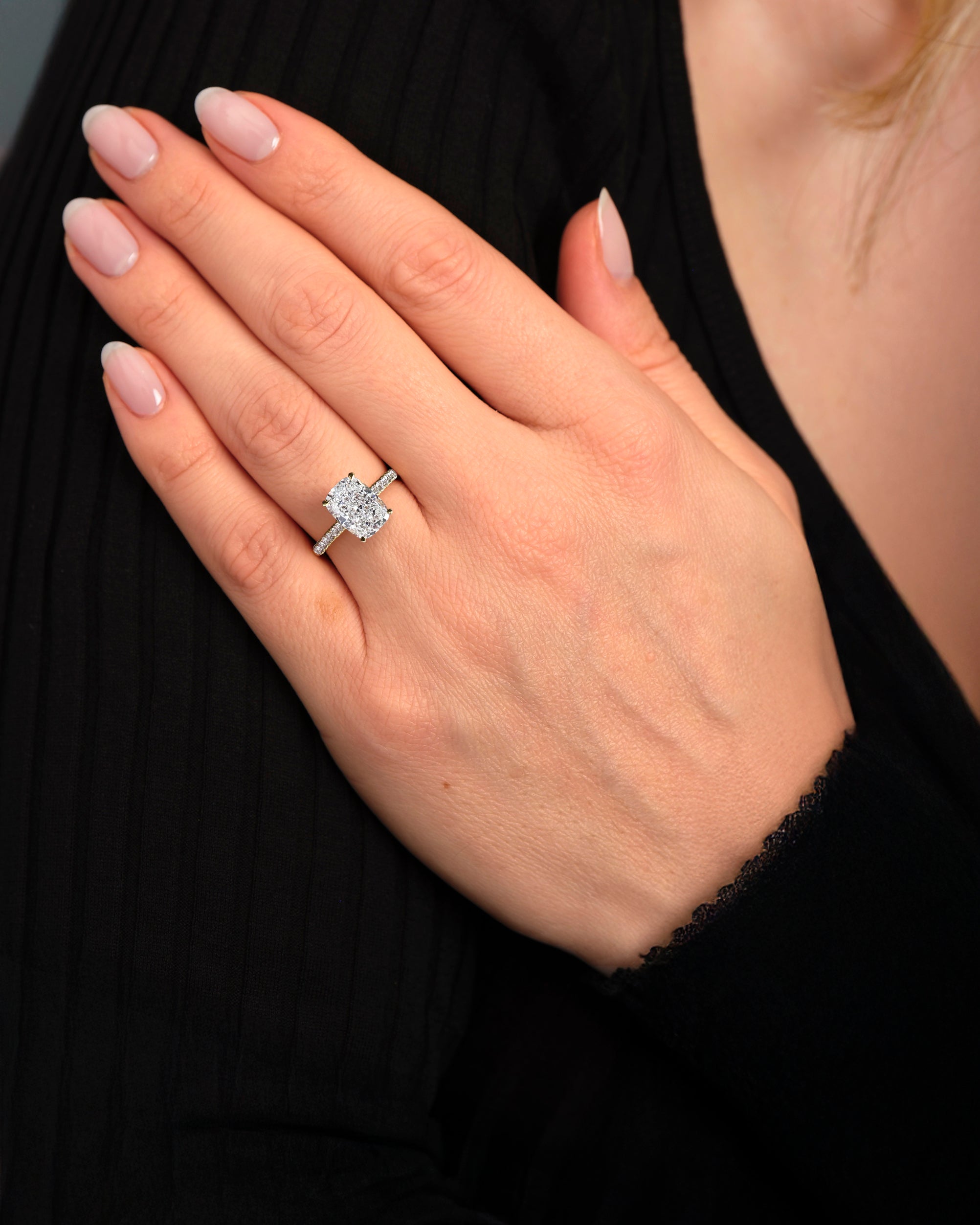 3ct elongated cushion cut lab grown diamond cathedral engagement ring hidden halo on hand