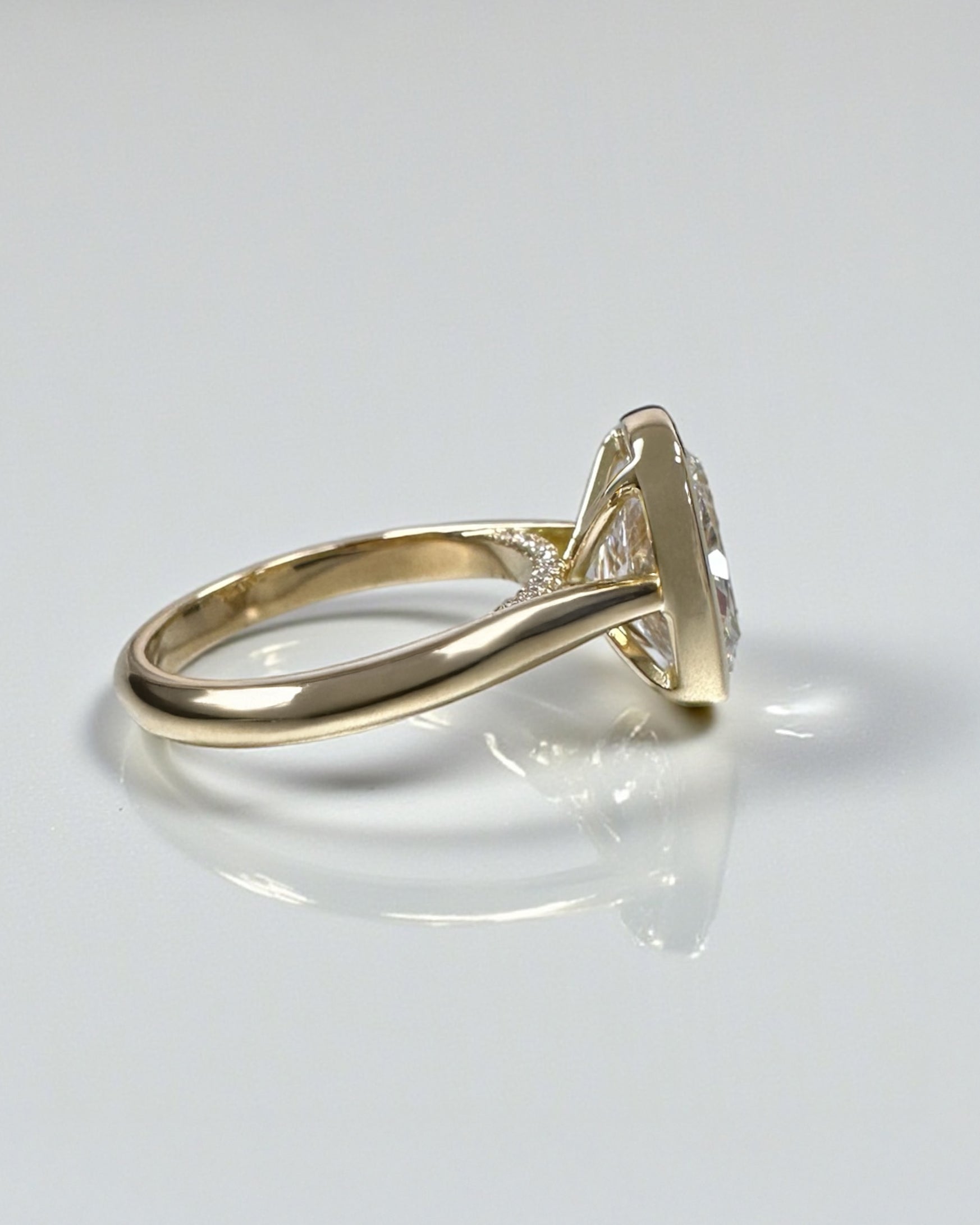 3ct elongated cushion cute lab grown diamond bezel setting plain band solitaire engagement ring, 18kt yellow gold