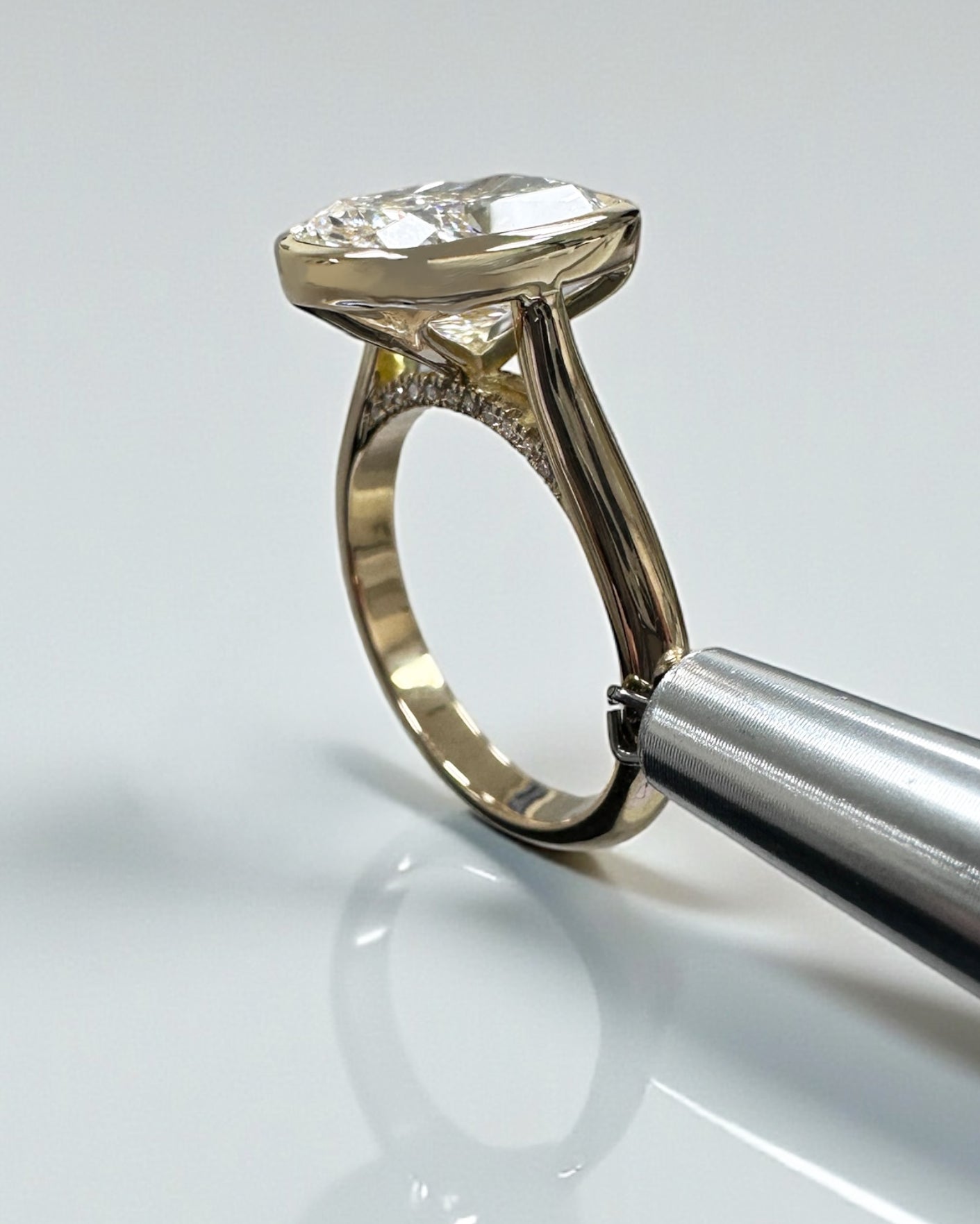 3ct elongated cushion cute lab grown diamond bezel setting plain band solitaire engagement ring, 18kt yellow gold