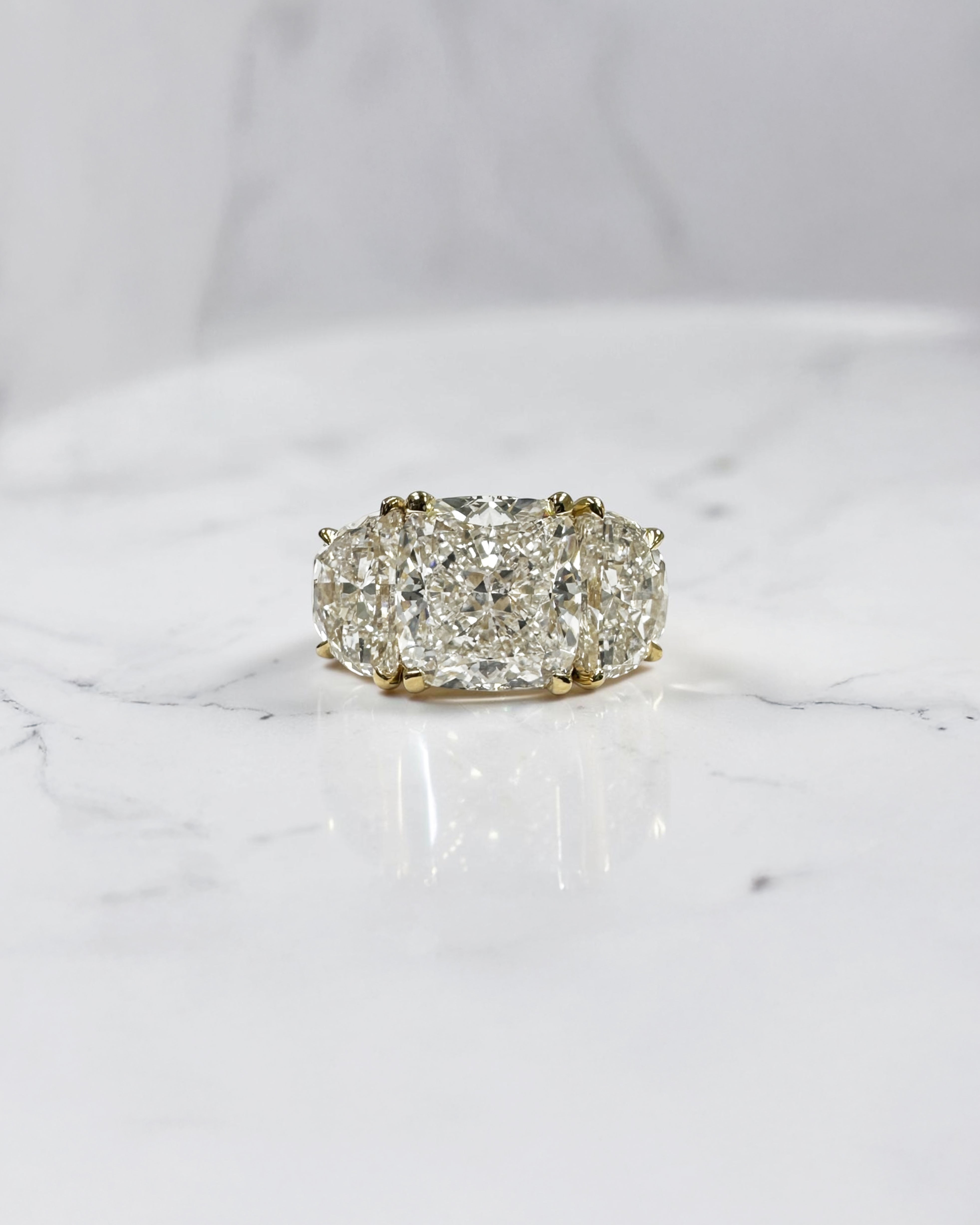 3ct cushion cut diamond trilogy engagement ring with half moon side stones, 4.50ct total, yellow gold, wide finger coverage