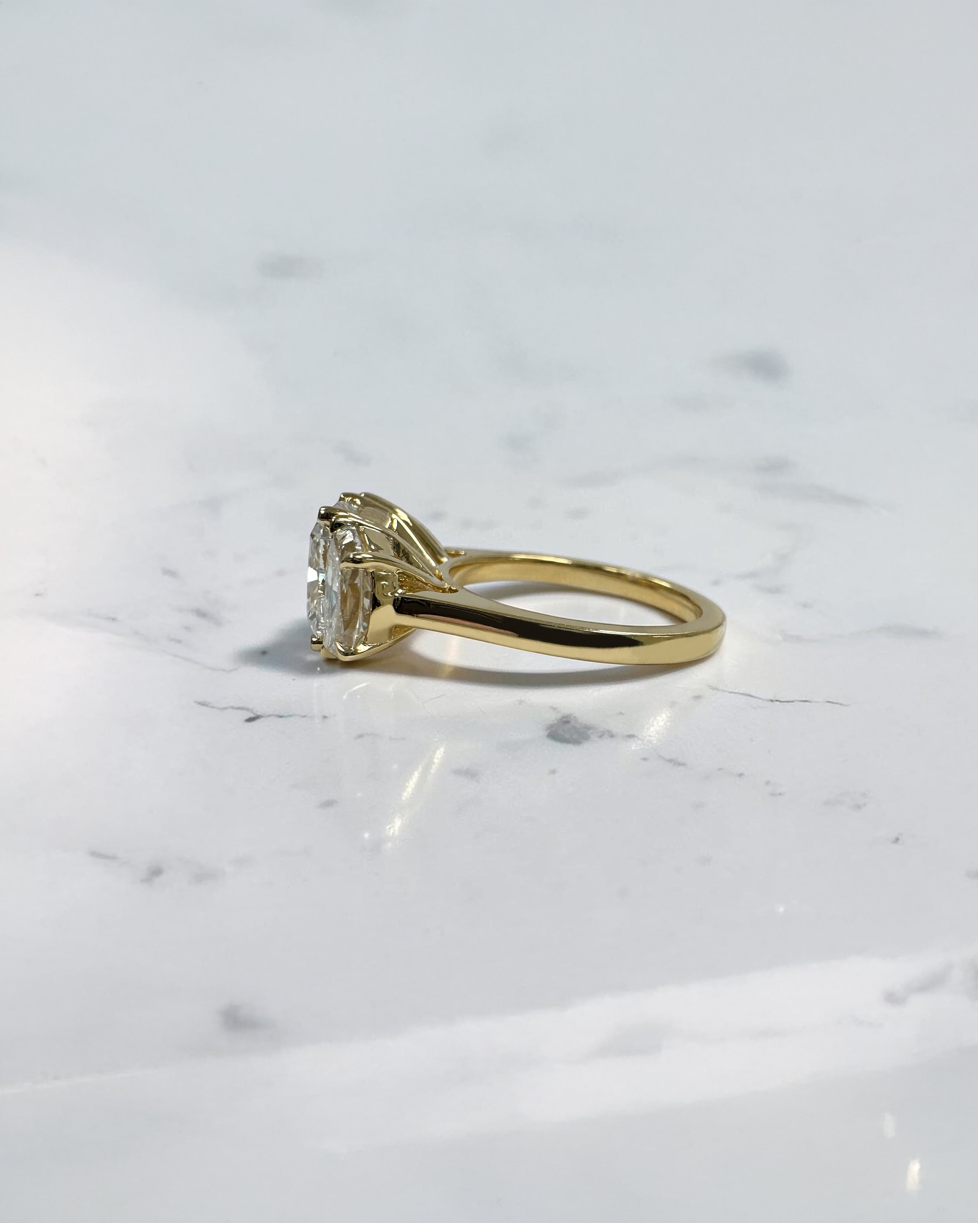 3ct cushion cut diamond trilogy engagement ring with half moon side stones, 4.50ct total, yellow gold, wide finger coverage
