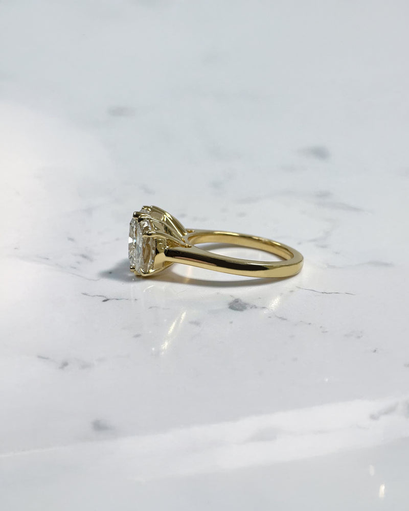 3ct cushion cut diamond trilogy engagement ring with half moon side stones, 4.50ct total, yellow gold, wide finger coverage
