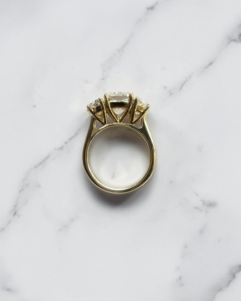 3ct cushion cut diamond trilogy engagement ring with half moon side stones, 4.50ct total, yellow gold, wide finger coverage
