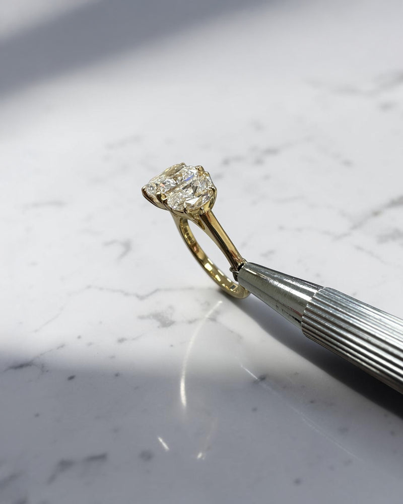 3ct cushion cut diamond trilogy engagement ring with half moon side stones, 4.50ct total, yellow gold, wide finger coverage

