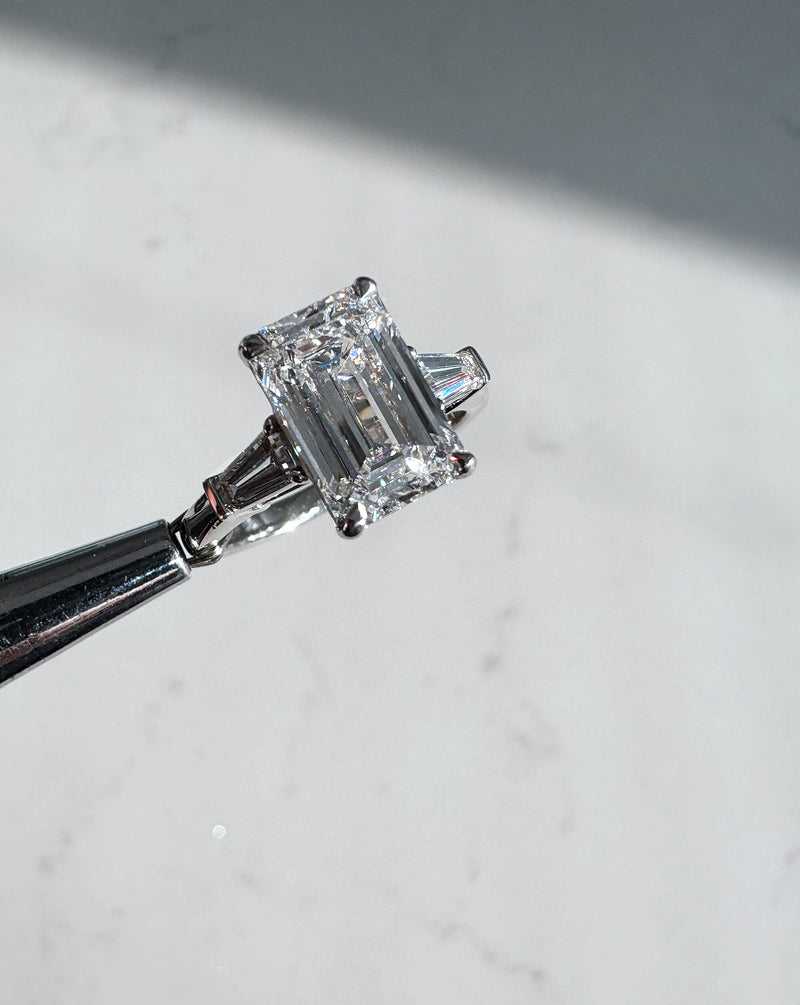 3ct Emerald Cut & Tapered Baguettes Trilogy diamond engagement rings.