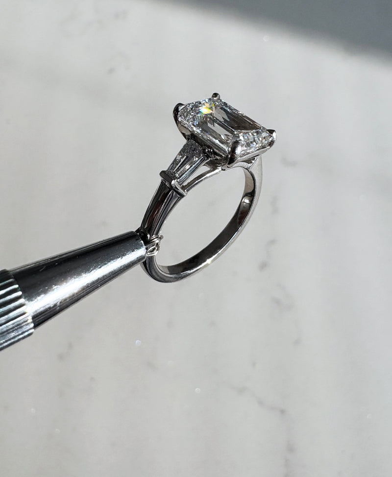 3ct Emerald Cut & Tapered Baguettes Trilogy diamond engagement rings.