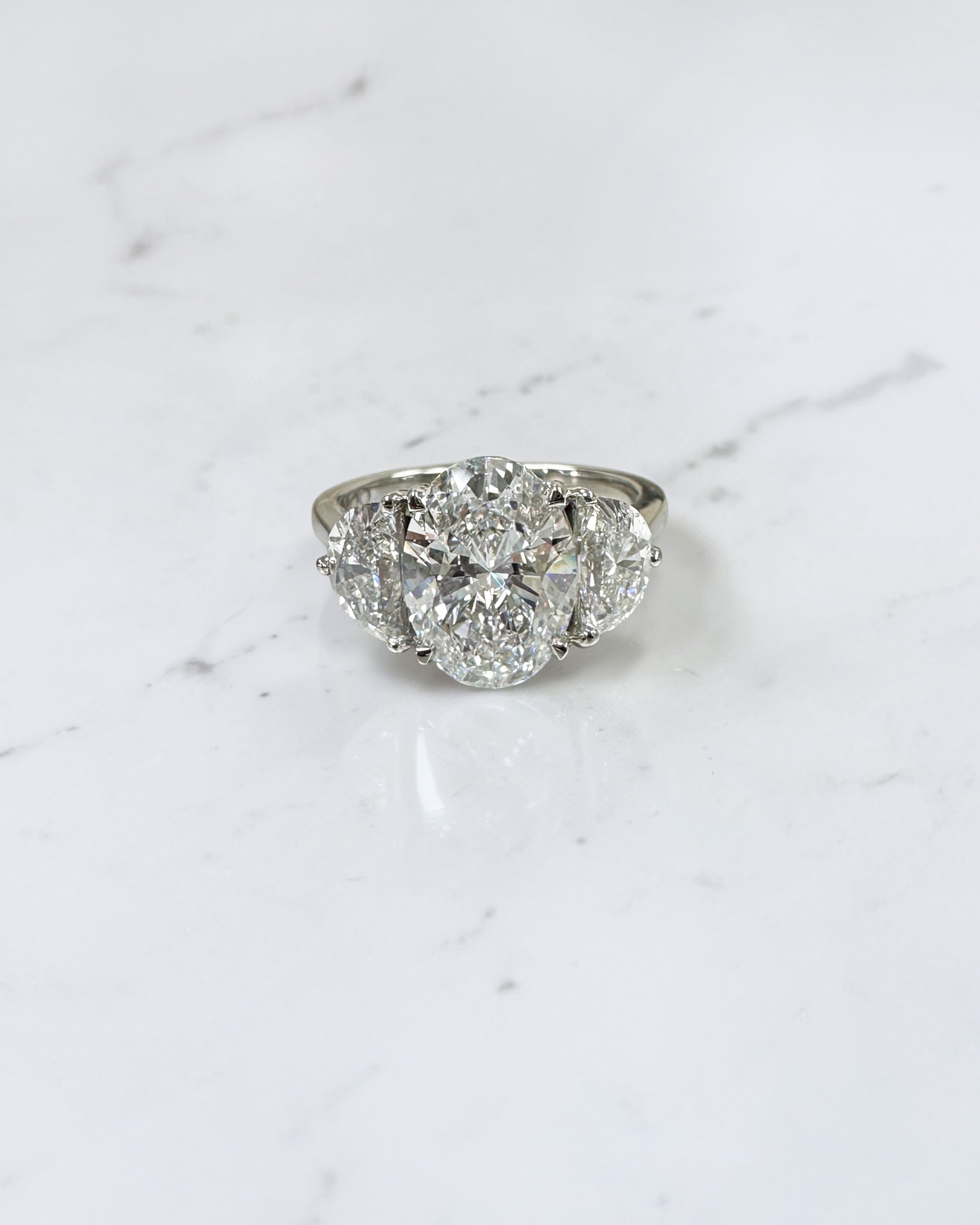 3ct oval cut lab grown diamond engagement ring with half moon side stones and hidden halo, total 4.40ct, polished platinum, handcrafted in London