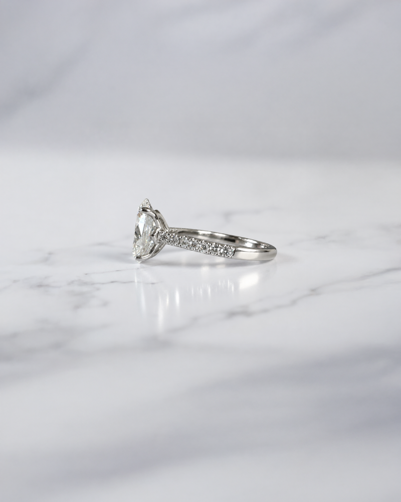 3ct oval cut lab grown diamond engagement platinum ring with lotus head setting, cathedral pavé diamond band and hidden diamond bridge, luxury solitaire ring  handcrafted in London