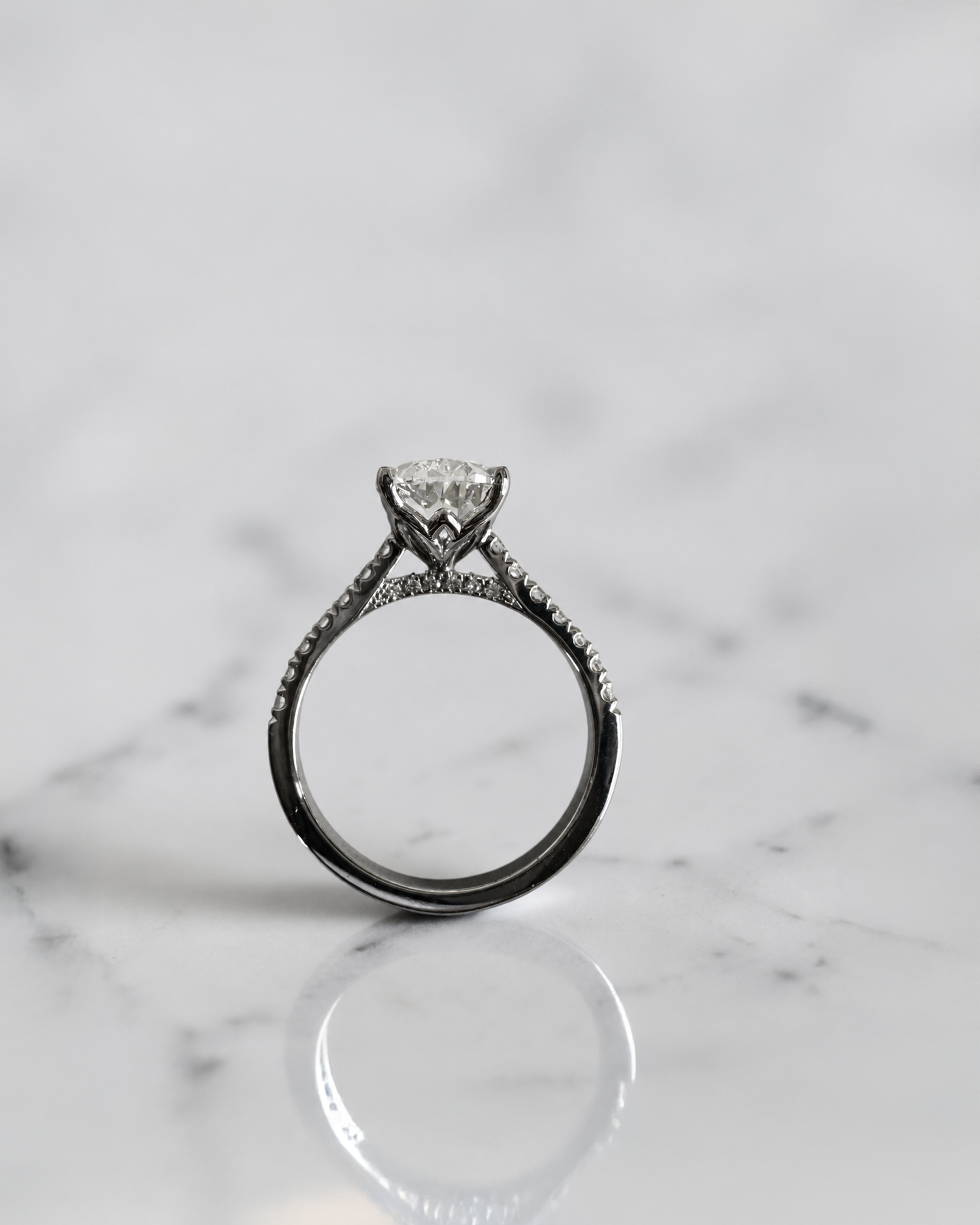 3ct oval cut lab grown diamond engagement platinum ring with lotus head setting, cathedral pavé diamond band and hidden diamond bridge, luxury solitaire ring  handcrafted in London