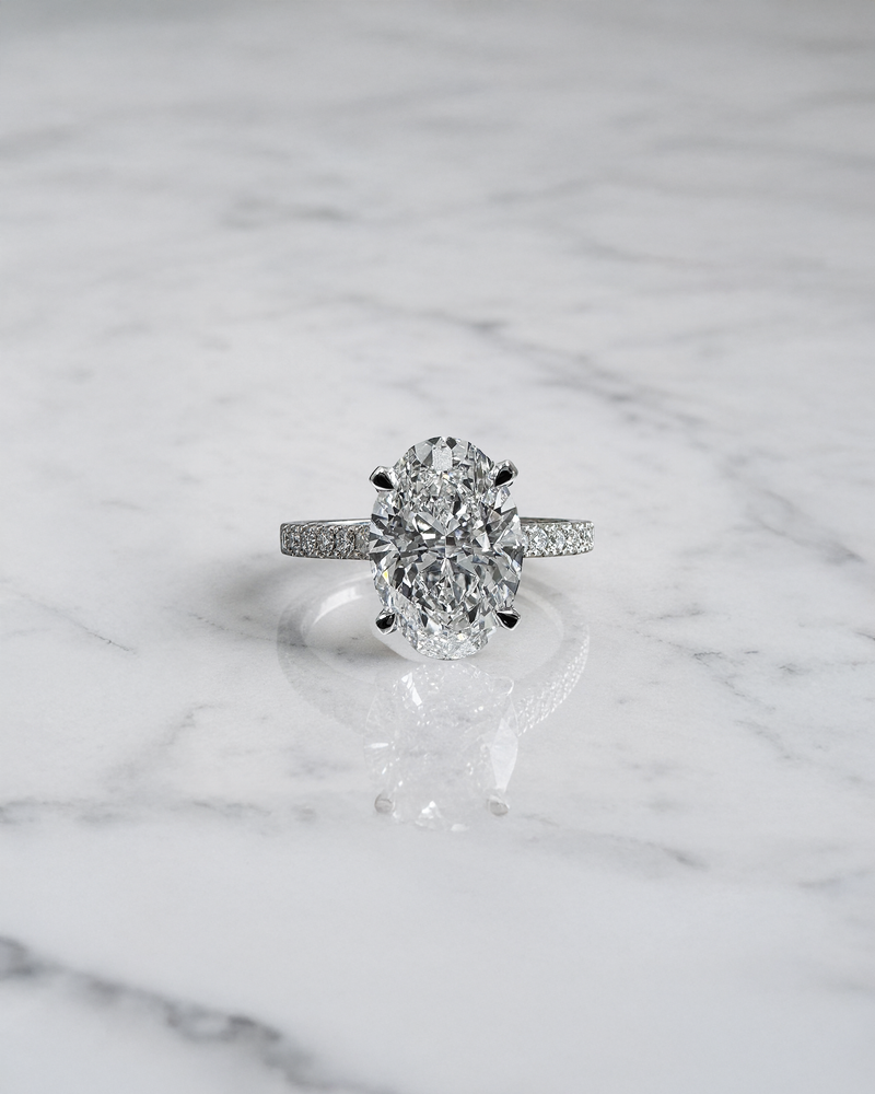 3ct oval cut lab grown diamond engagement platinum ring with lotus head setting, cathedral pavé diamond band and hidden diamond bridge, luxury solitaire ring  handcrafted in London