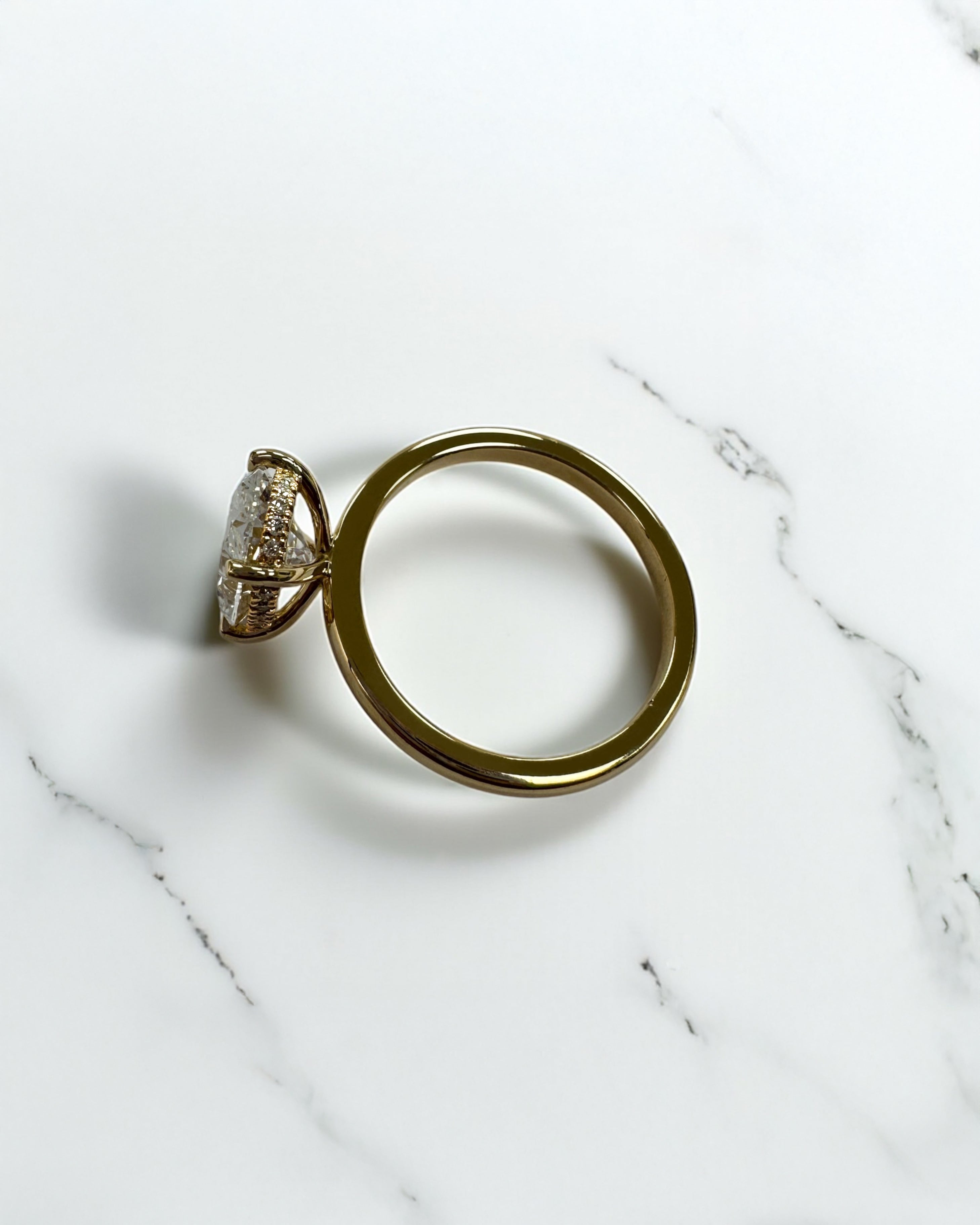 3ct oval lab grown diamond hidden halo solitaire engagement ring in 18kt yellow gold, layla diamonds london