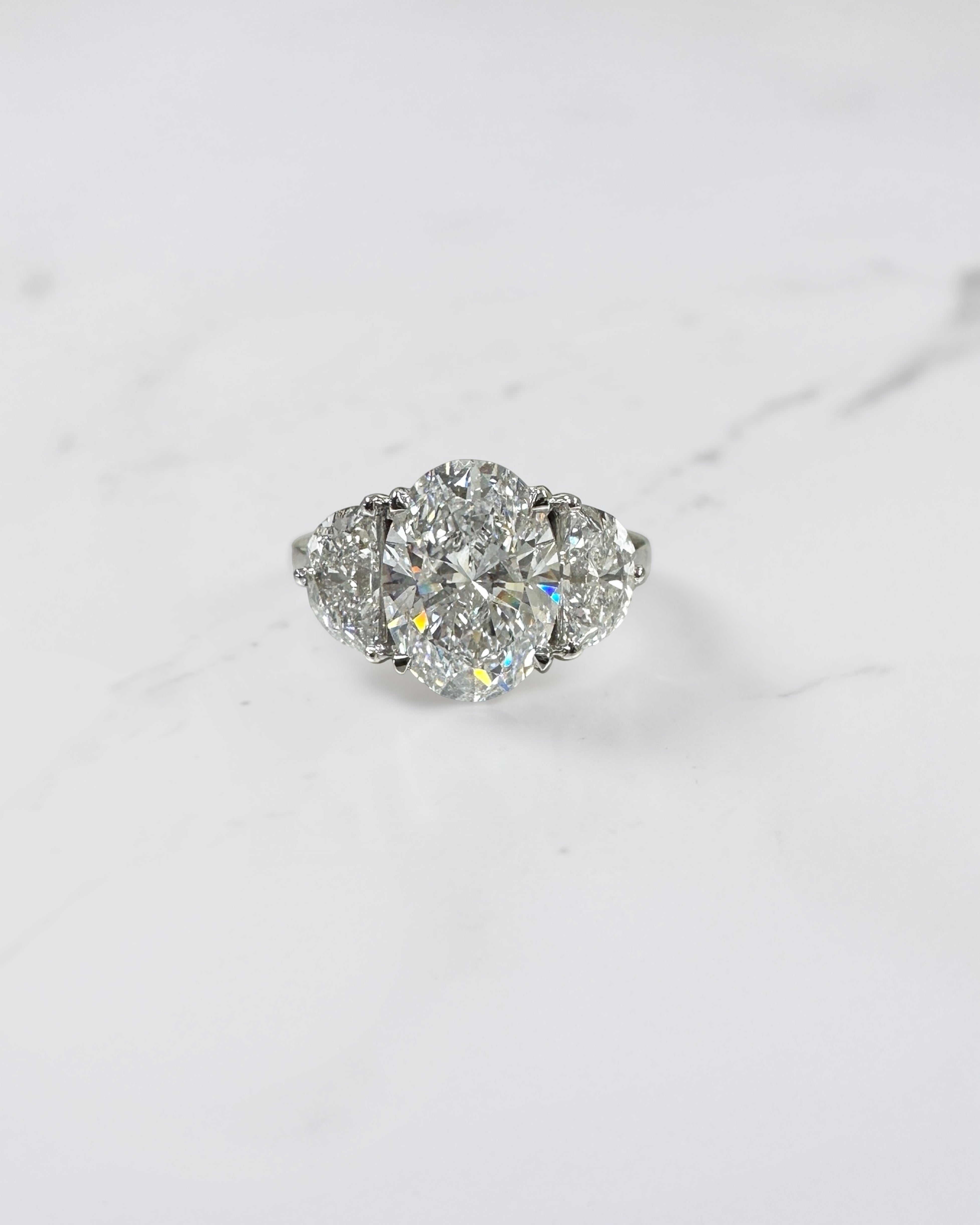 3ct oval cut lab grown diamond engagement ring with half moon side stones and hidden halo, total 4.40ct, polished platinum, handcrafted in London