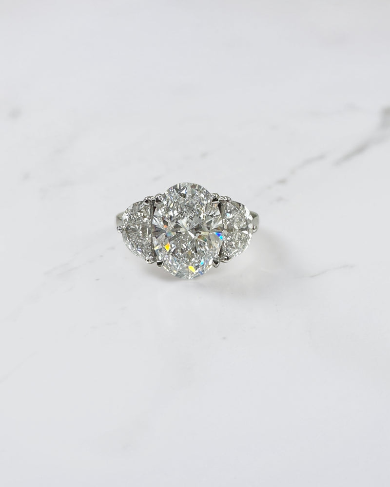 3ct oval cut lab grown diamond engagement ring with half moon side stones and hidden halo, total 4.40ct, polished platinum, handcrafted in London