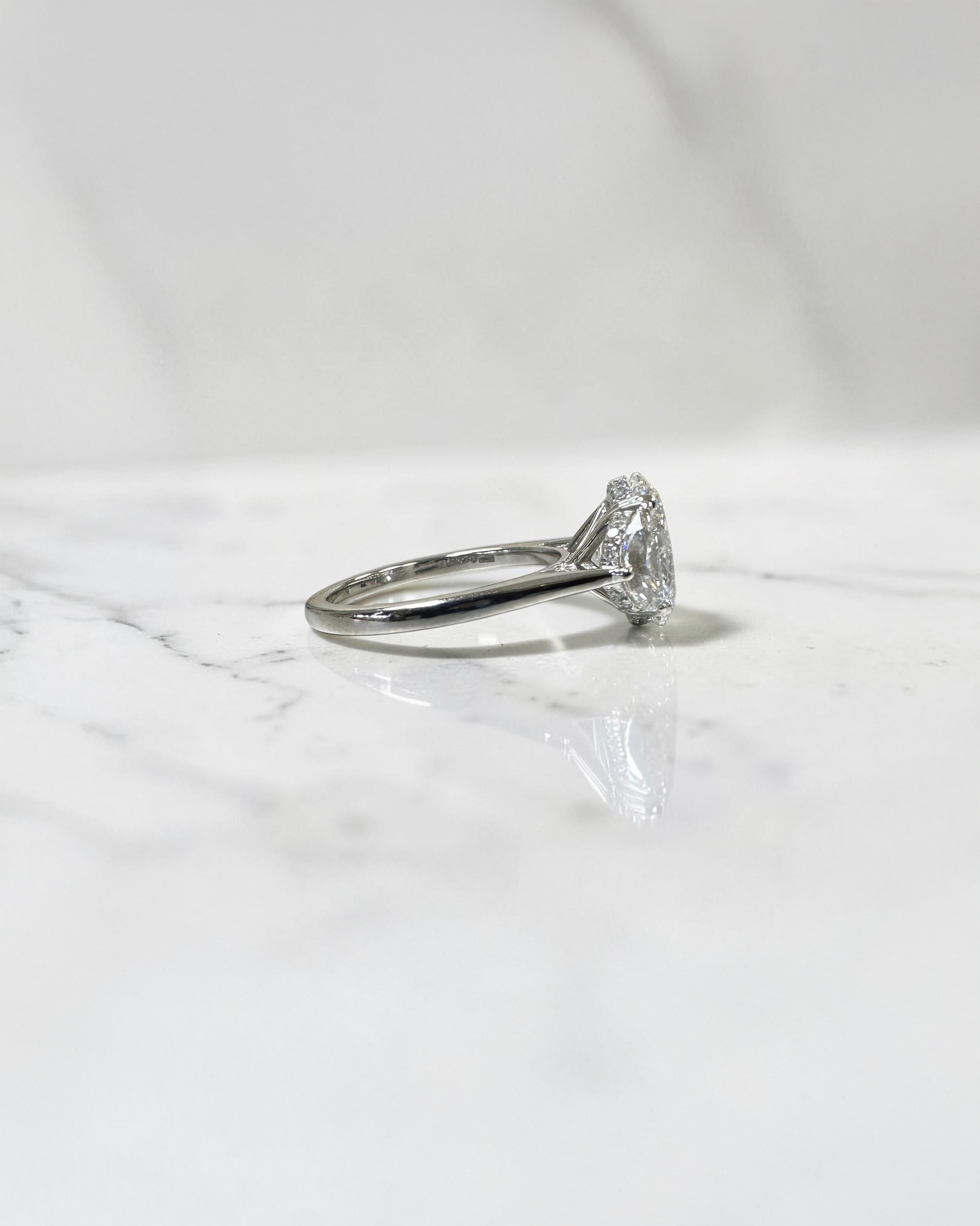 3ct oval cut lab grown diamond engagement ring with half moon side stones and hidden halo, total 4.40ct, polished platinum, handcrafted in London