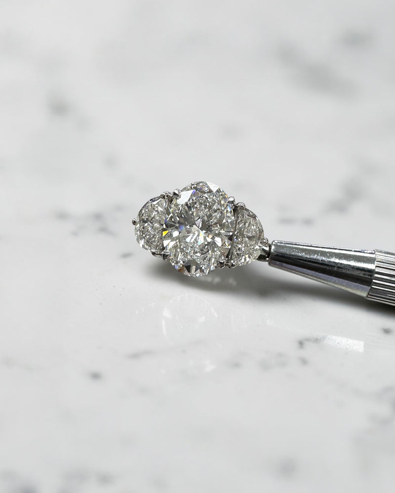3ct oval cut lab grown diamond engagement ring with half moon side stones and hidden halo, total 4.40ct, polished platinum, handcrafted in London
