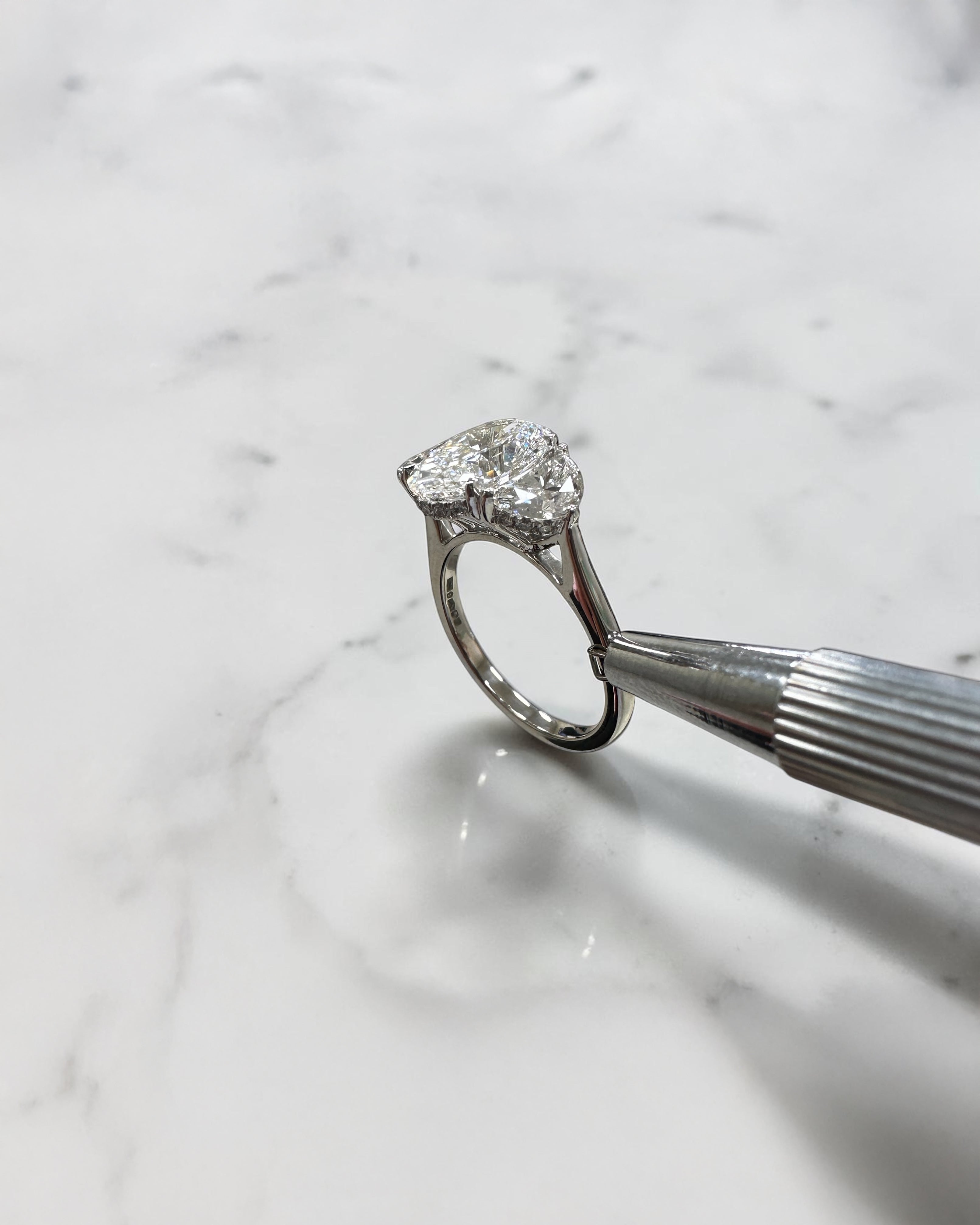 3ct oval cut lab grown diamond engagement ring with half moon side stones and hidden halo, total 4.40ct, polished platinum, handcrafted in London