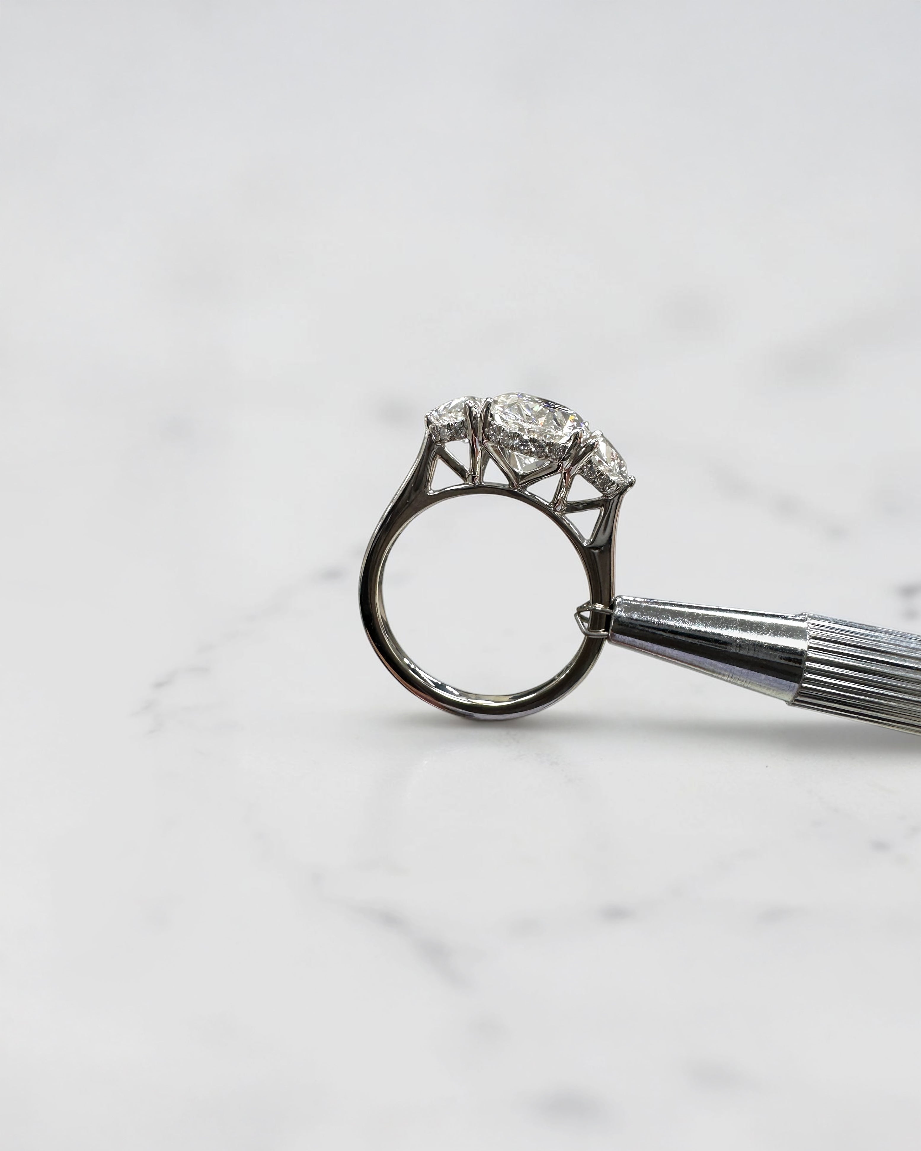 3ct oval cut lab grown diamond engagement ring with half moon side stones and hidden halo, total 4.40ct, polished platinum, handcrafted in London