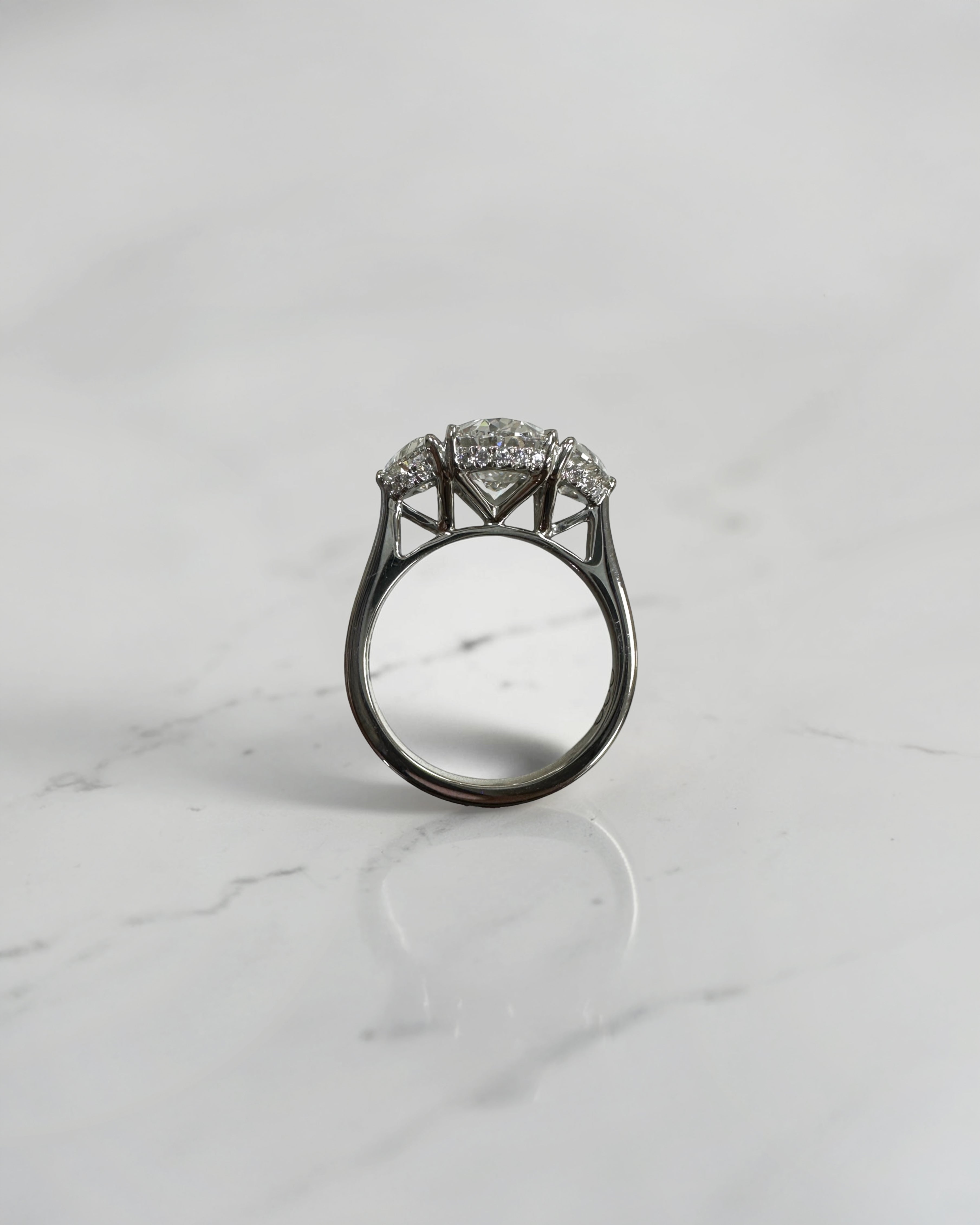 3ct oval cut lab grown diamond engagement ring with half moon side stones and hidden halo, total 4.40ct, polished platinum, handcrafted in London