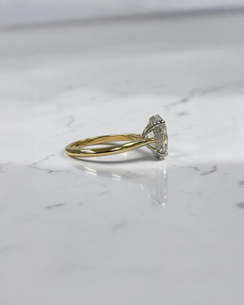3ct oval cut lab grown diamond engagement ring with hidden halo and cathedral setting in two tone yellow gold plain band with platinum head solitaire, handcrafted in London