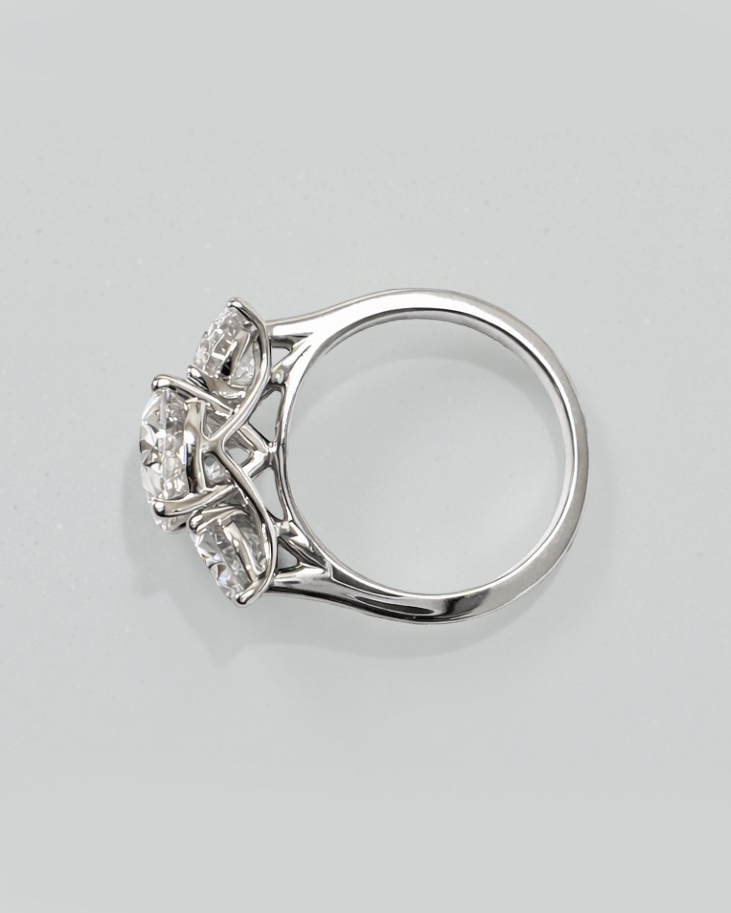 5ct oval cut lab grown diamond trilogy engagement ring with 3ct centre oval and matching oval side stones in polished white gold or platinum setting