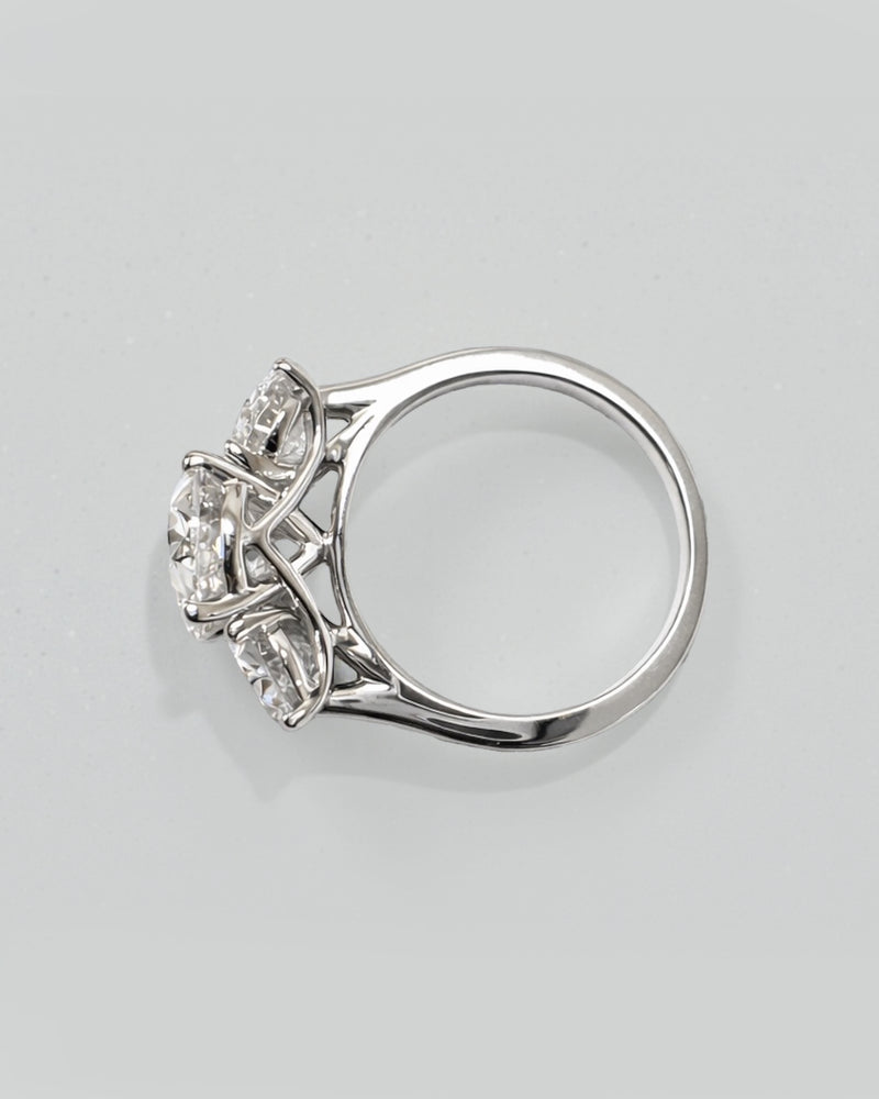 5ct oval cut lab grown diamond trilogy engagement ring with 3ct centre oval and matching oval side stones in polished white gold or platinum setting