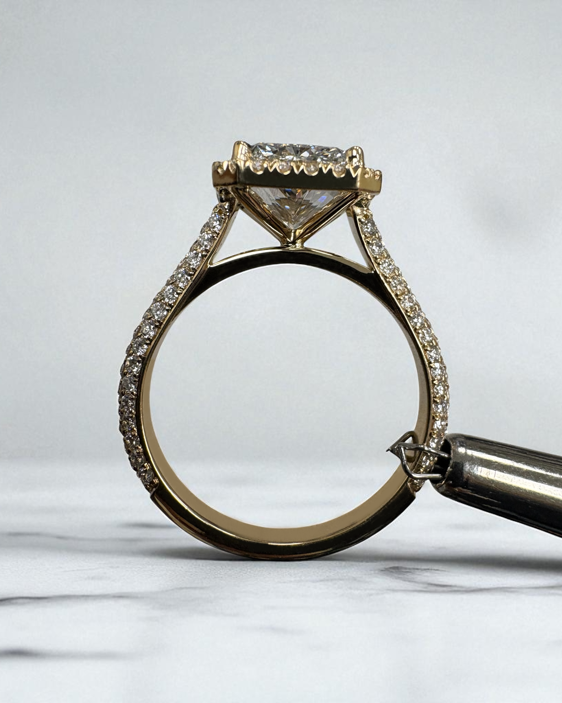 3ct radiant cut seamless halo 3d diamond band engagement ring yellow gold lab grown diamond on hand