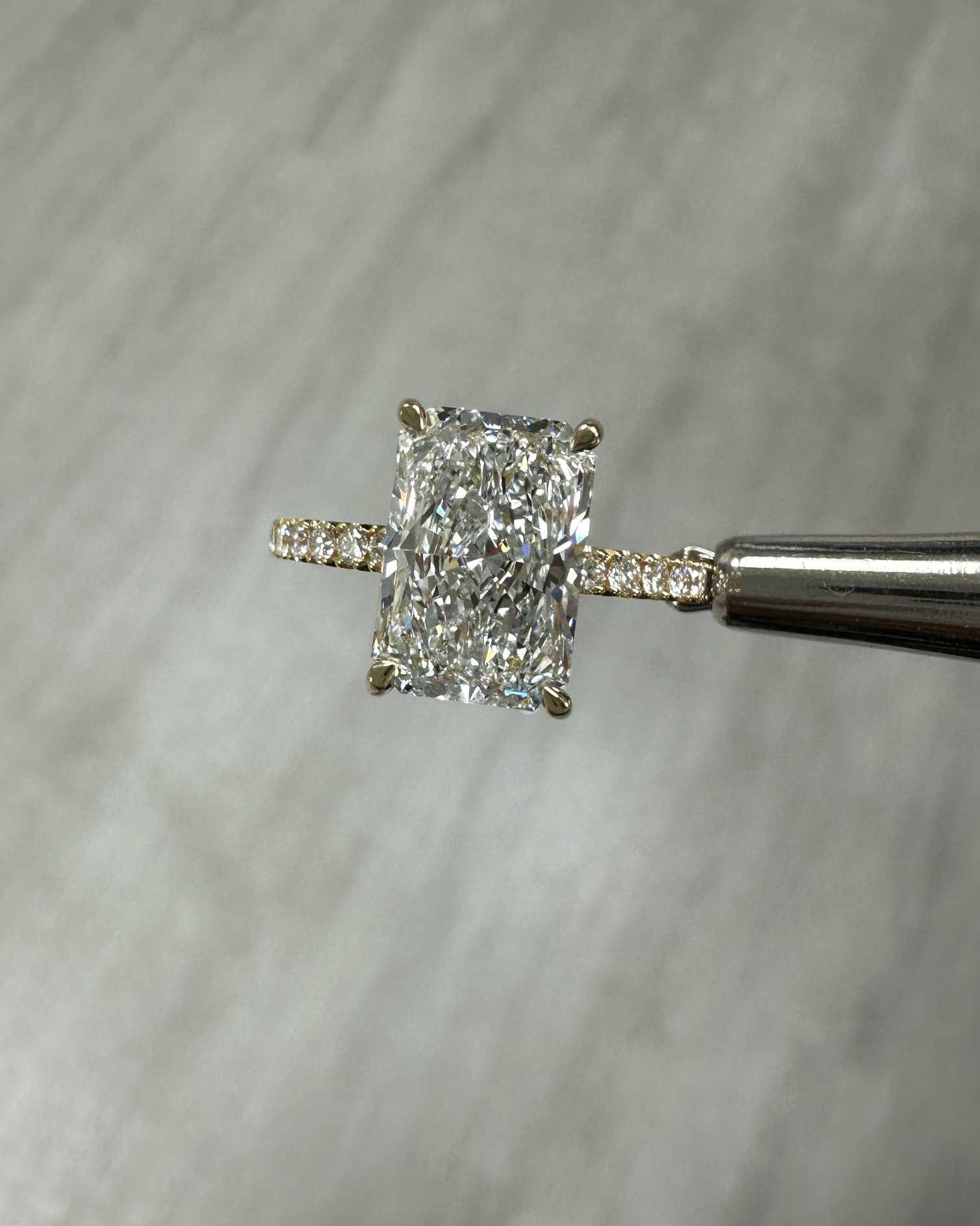 3ct Radiant Hidden Halo lab grown Diamond Engagement Rings in London 18kt yellow gold 