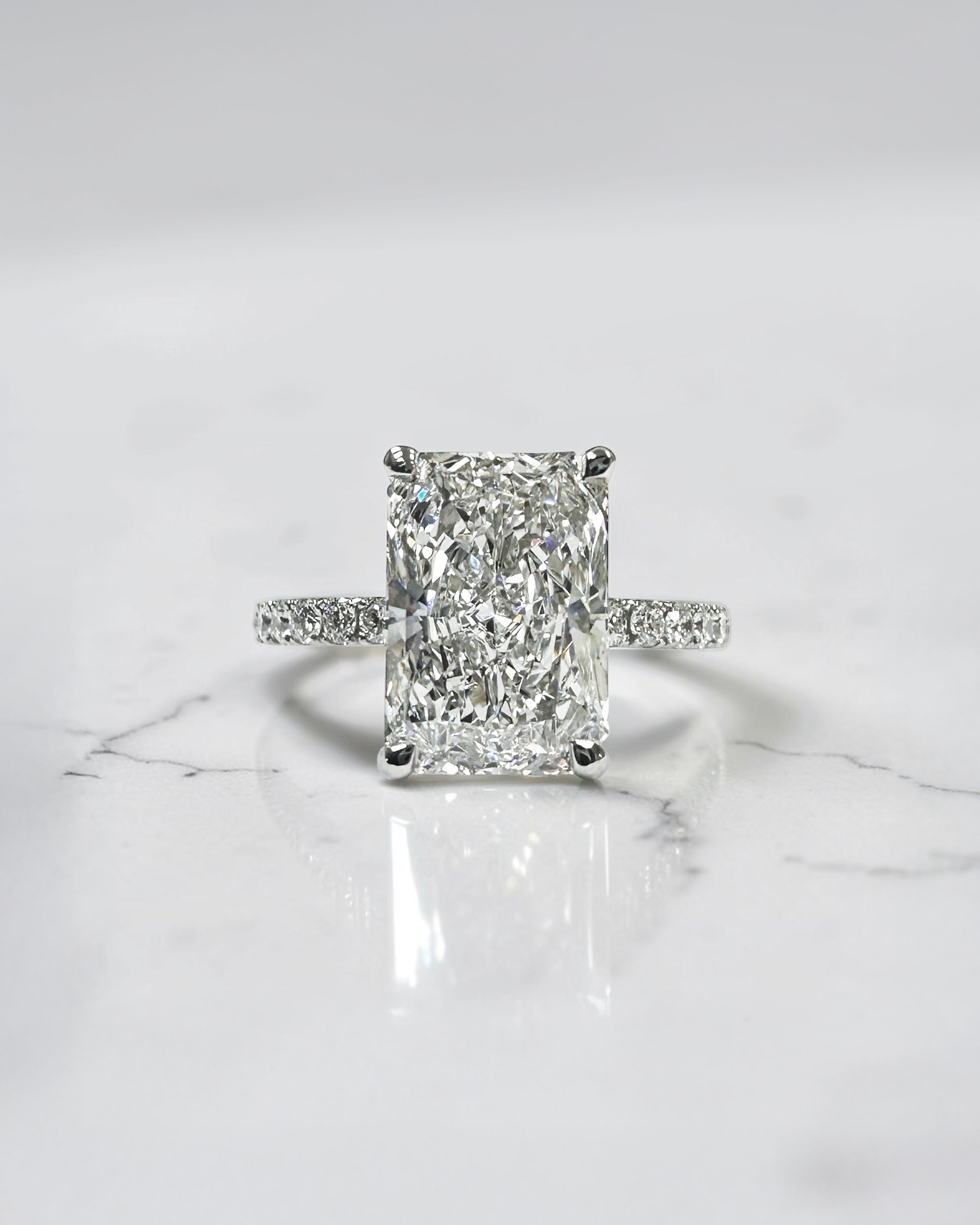 3ct radiant hidden halo diamond shoulder band floating head, platinum engagement ring