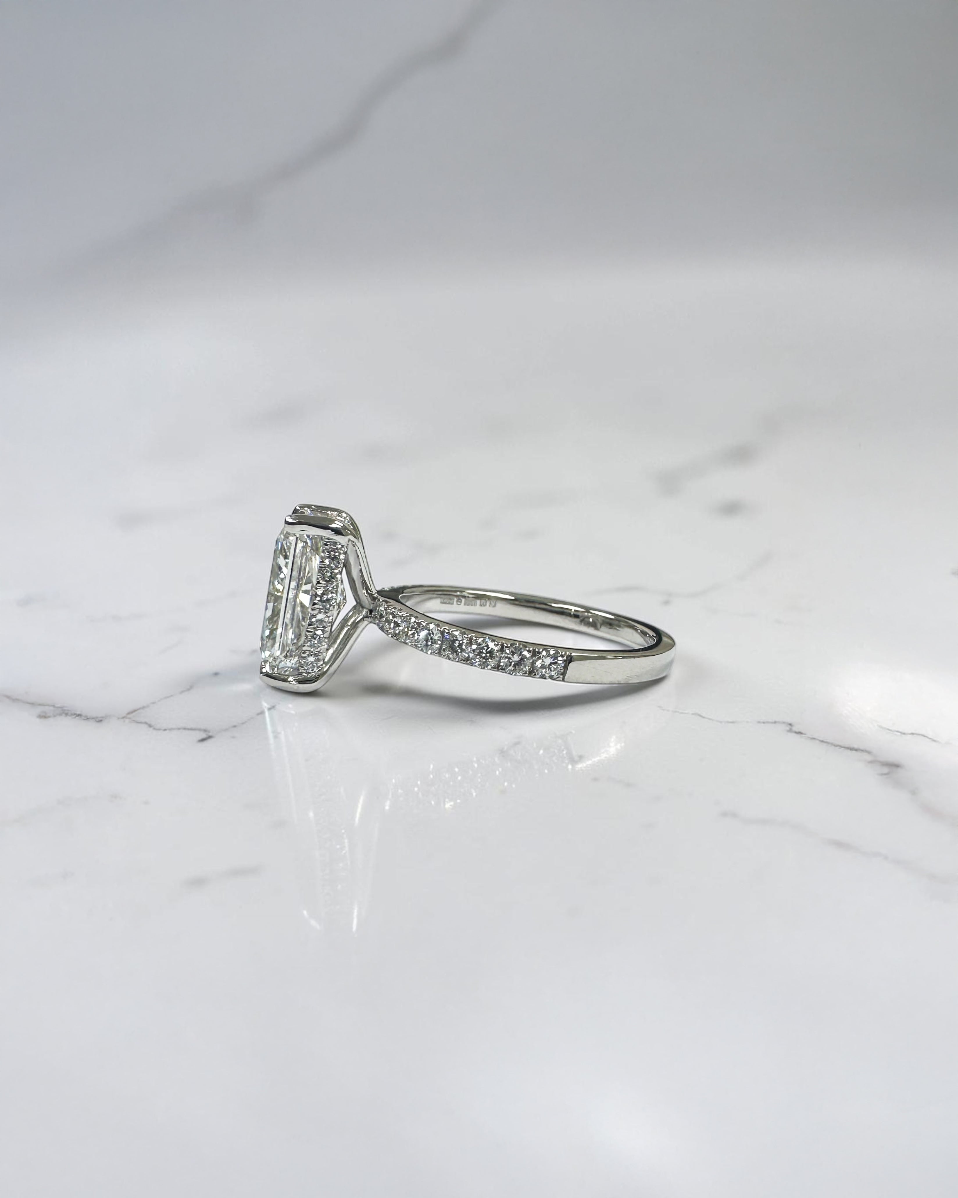3ct radiant hidden halo diamond shoulder band floating head, platinum engagement ring