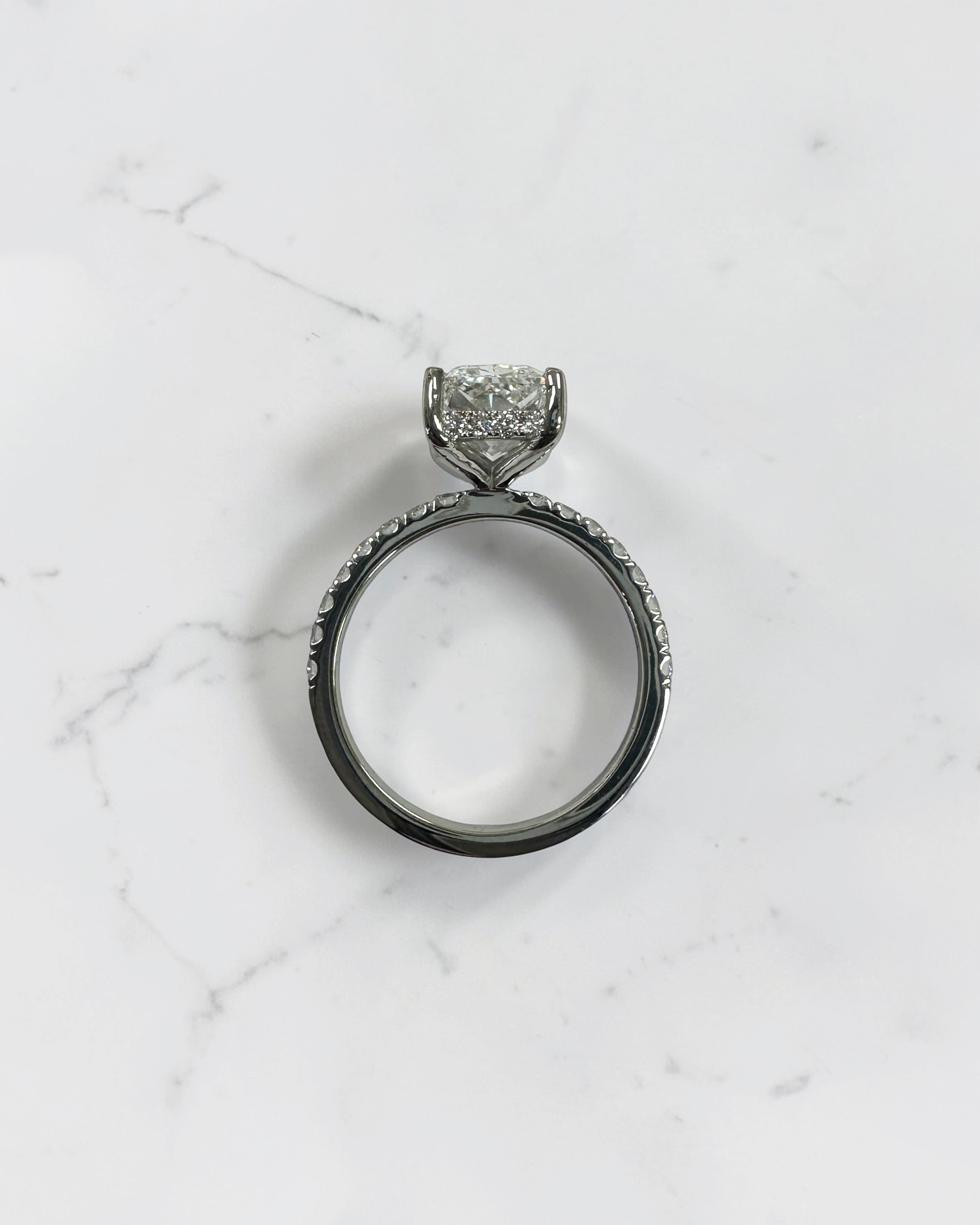 3ct radiant hidden halo diamond shoulder band floating head, platinum engagement ring
