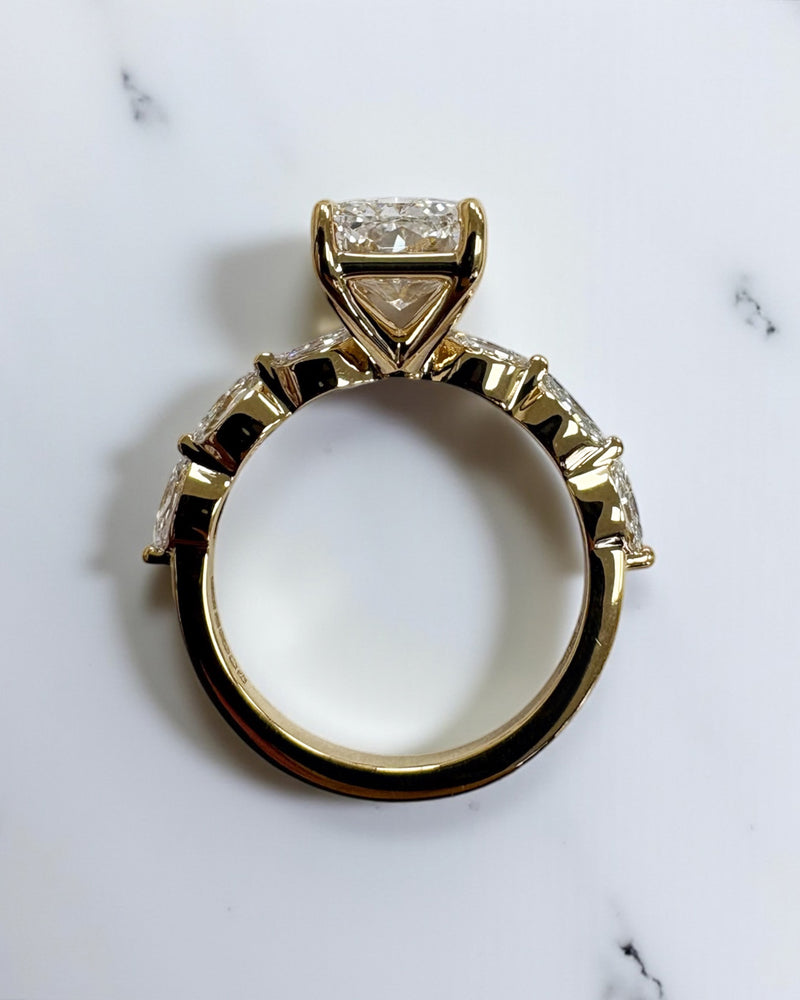 3ct Radiant cut lab grown diamond set with marquise side diamonds on the band, engagement ring, 18kt yellow gold 