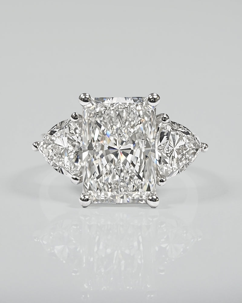 3ct radiant cut lab grown diamond engagement ring UK with trillion side stones, 4.40ct trilogy engagement ring design in polished white gold or platinum handcrafted in London