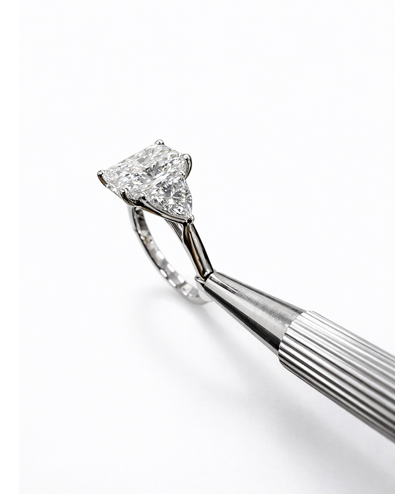 3ct radiant cut lab grown diamond engagement ring UK with trillion side stones, 4.40ct trilogy engagement ring design in polished white gold or platinum handcrafted in London