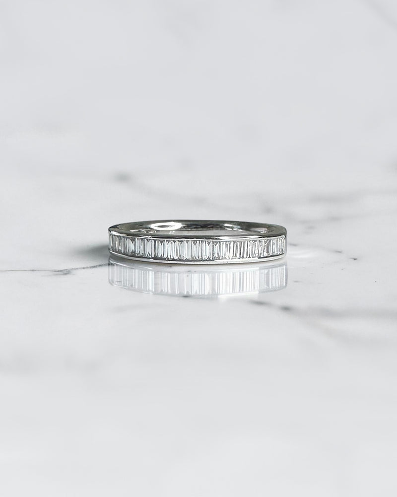 Half set 3mm channel set baguette diamond wedding band in 18ct yellow gold, white gold or platinum, available with lab grown or natural diamonds.