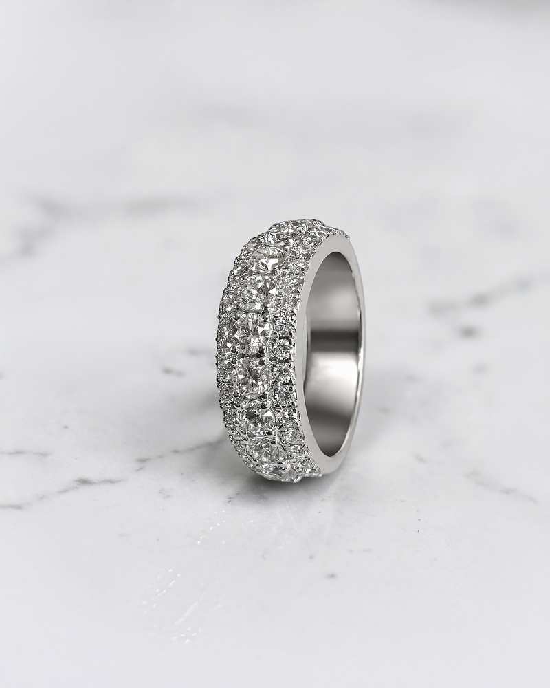 2.70ct three row round brilliant diamond band ring with graduated centre diamonds and 7.7mm wide band
Platinum or 18kt white gold