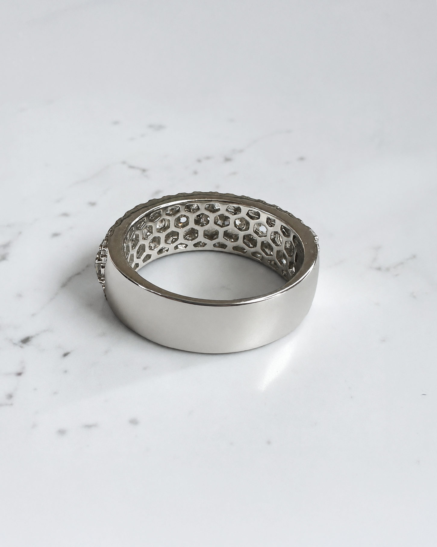 2.70ct three row round brilliant diamond band ring with graduated centre diamonds and 7.7mm wide band
Platinum or 18kt white gold